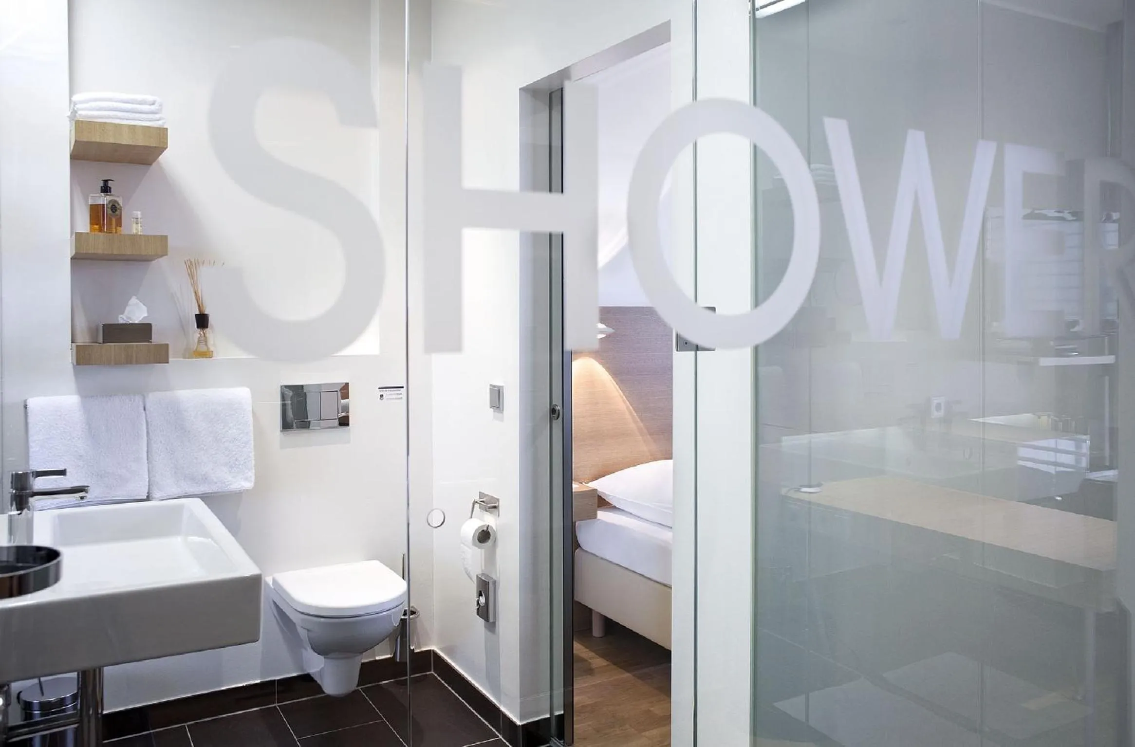 Bathroom, Bed in Hotel Ploberger