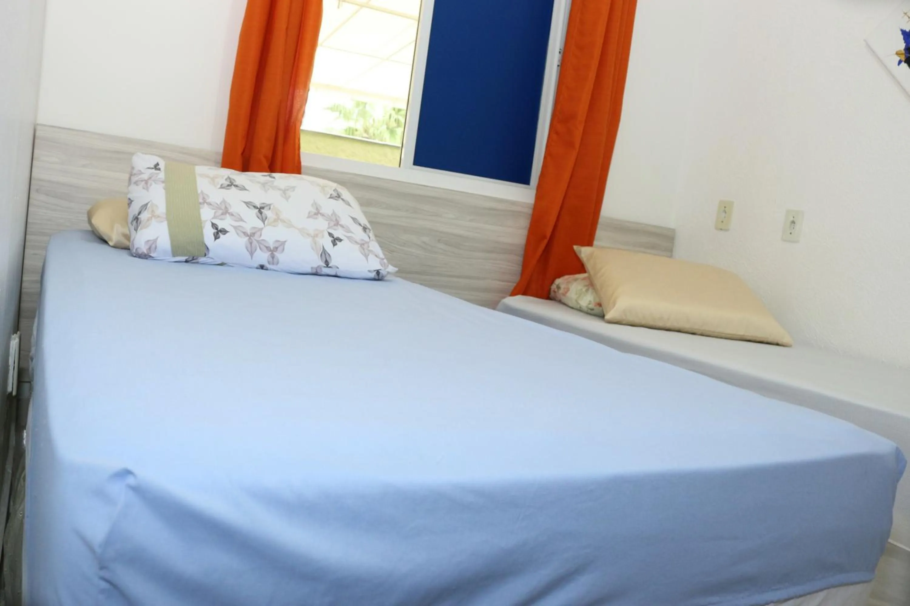 Bed in Pousada Executiva SolRiso Aeroporto Florianópolis