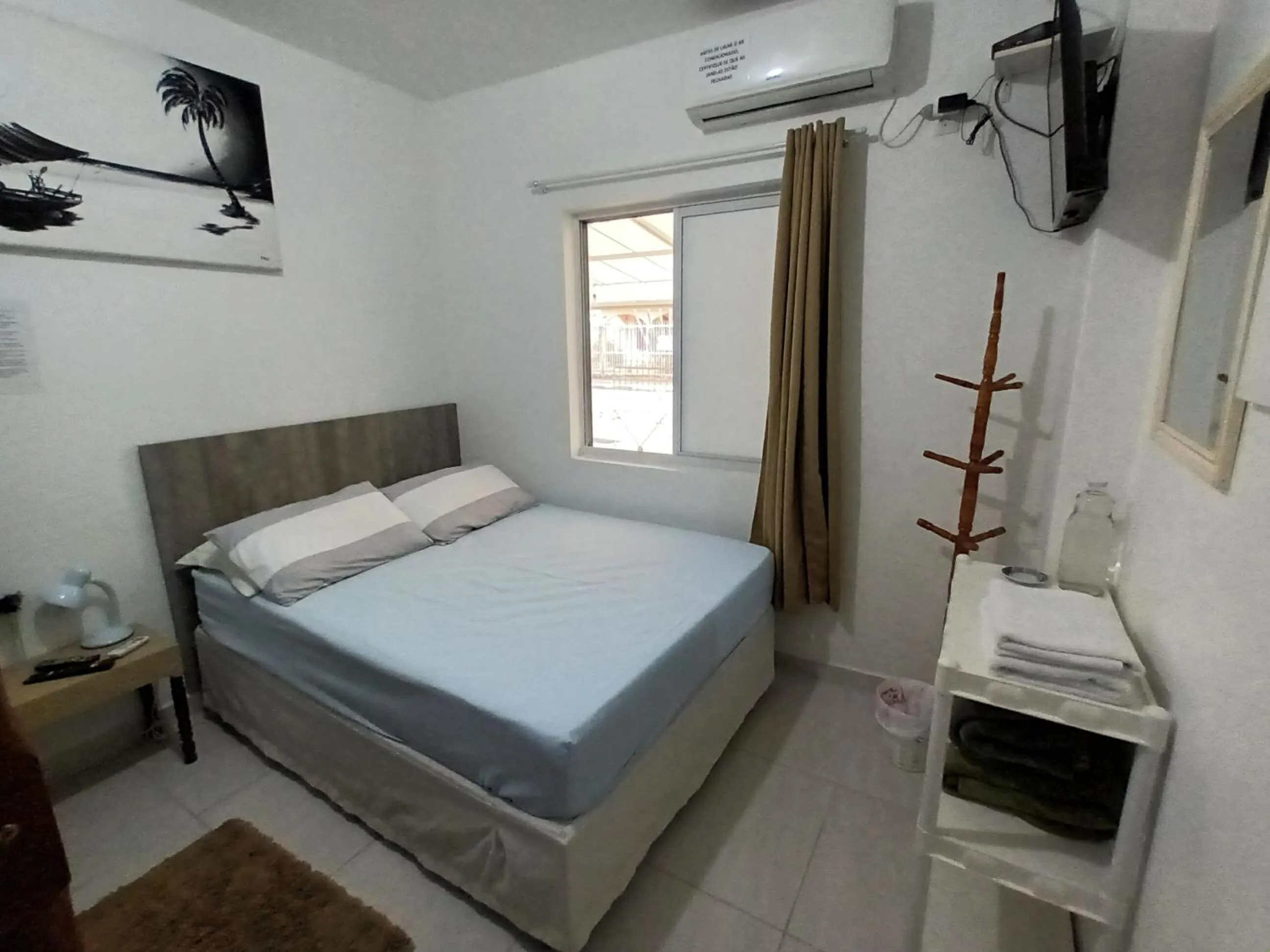 Bed in Pousada Executiva SolRiso Aeroporto Florianópolis