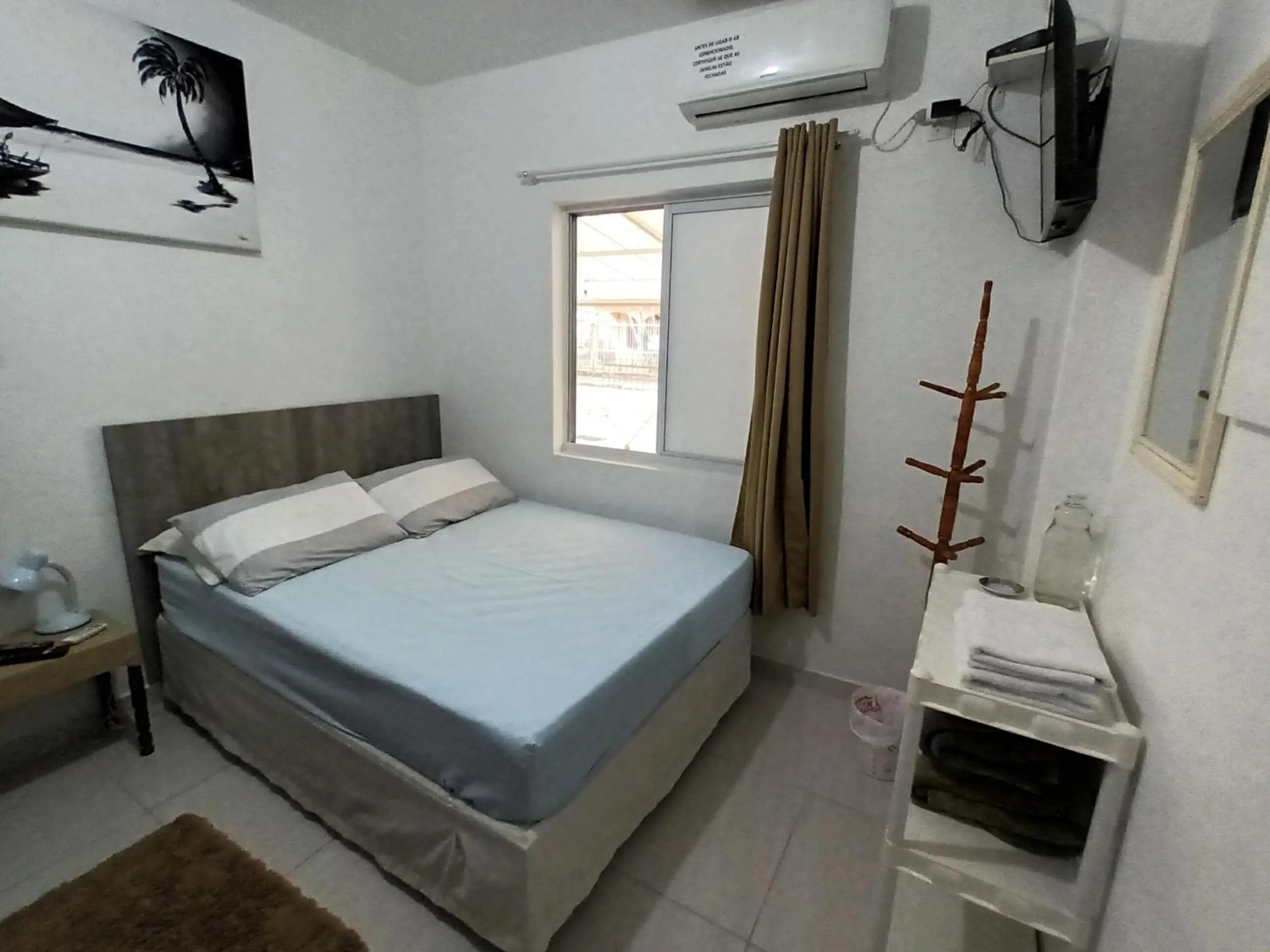 Bed in Pousada Executiva SolRiso Aeroporto Florianópolis