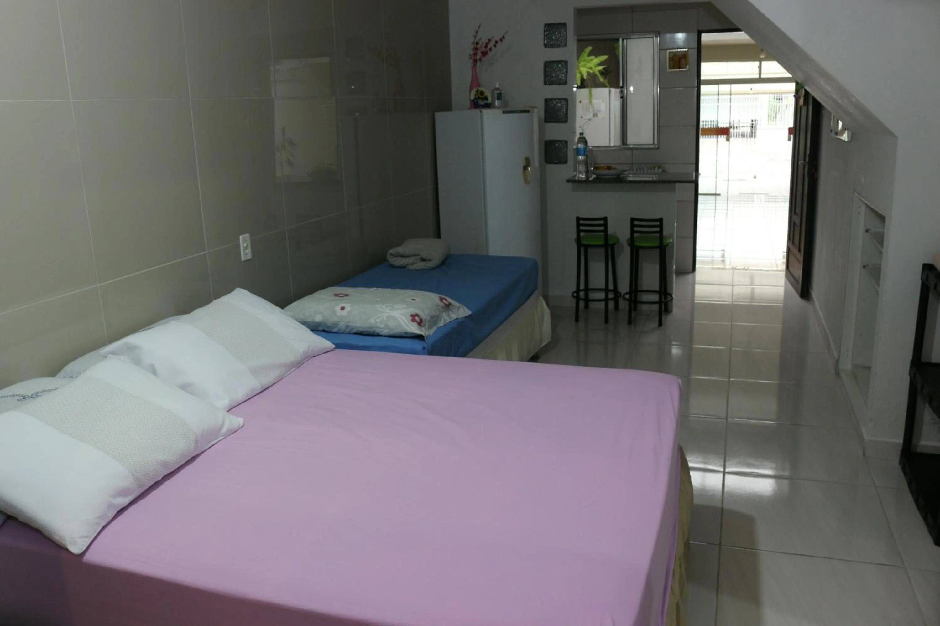 Bed in Pousada Executiva SolRiso Aeroporto Florianópolis