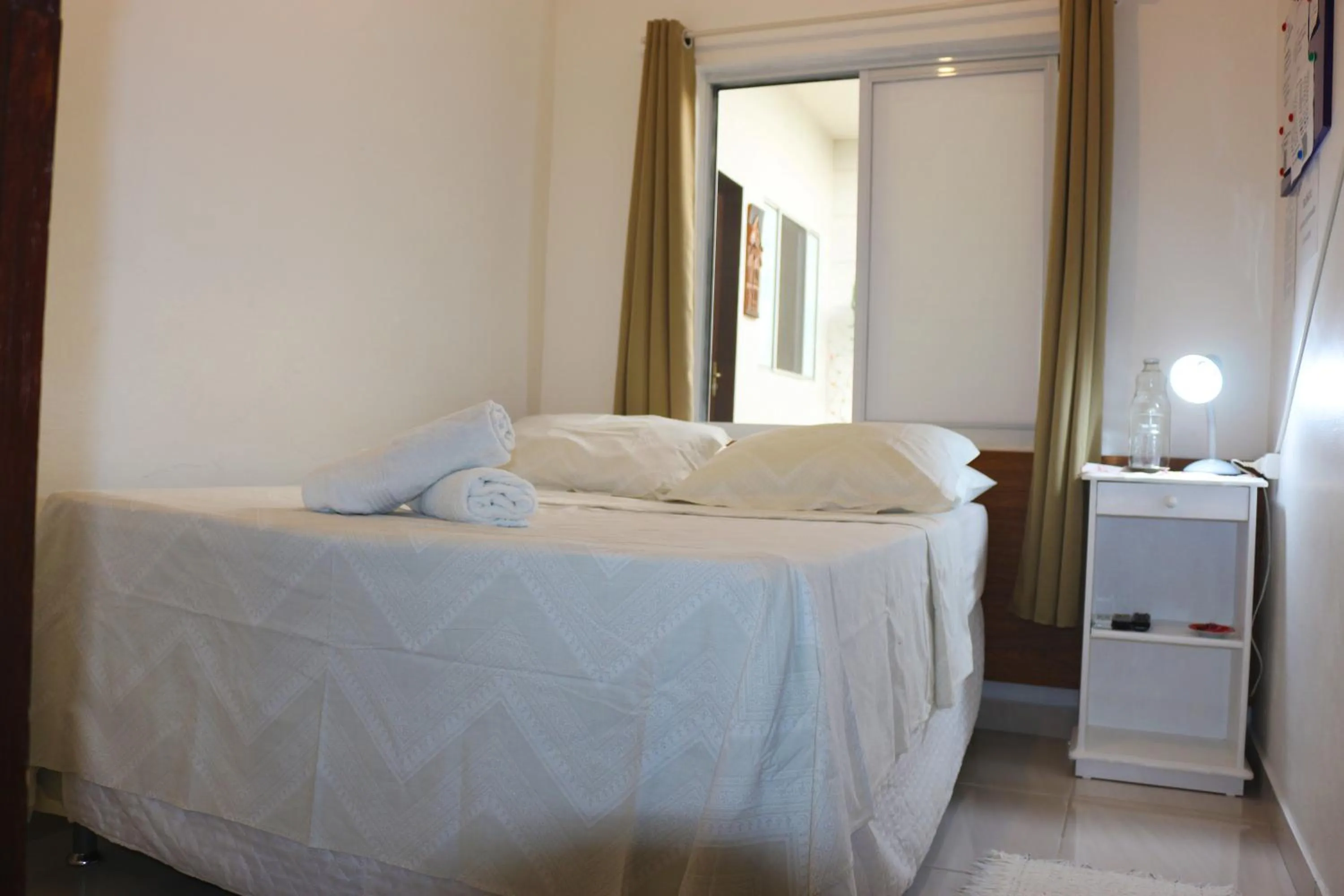 Bed in Pousada Executiva SolRiso Aeroporto Florianópolis