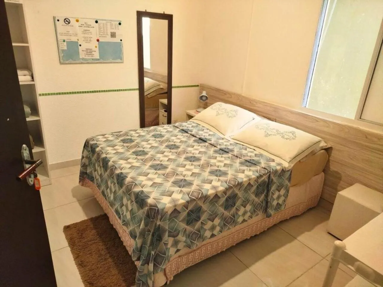 Bed in Pousada Executiva SolRiso Aeroporto Florianópolis