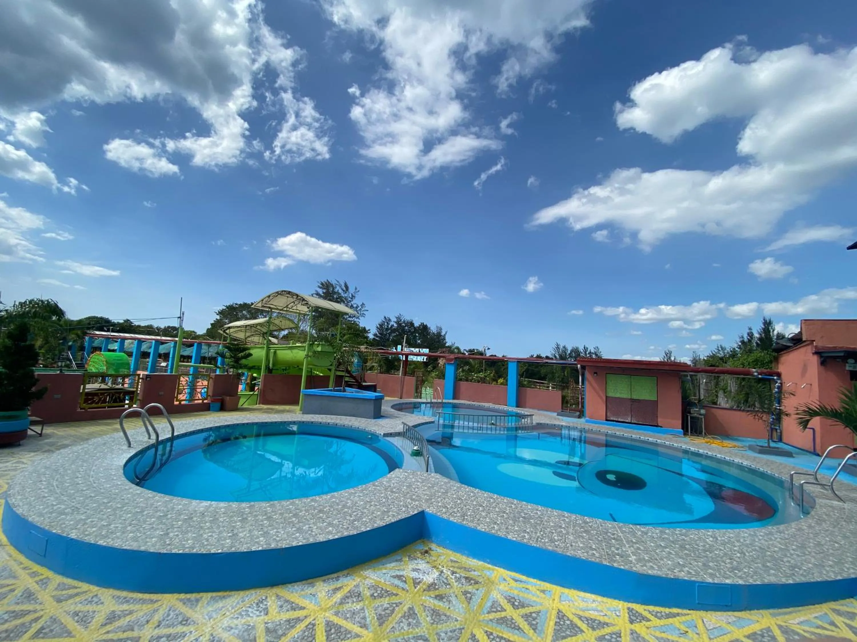 Swimming pool in RedDoorz Plus @ Lhexlyn Resort San Narciso