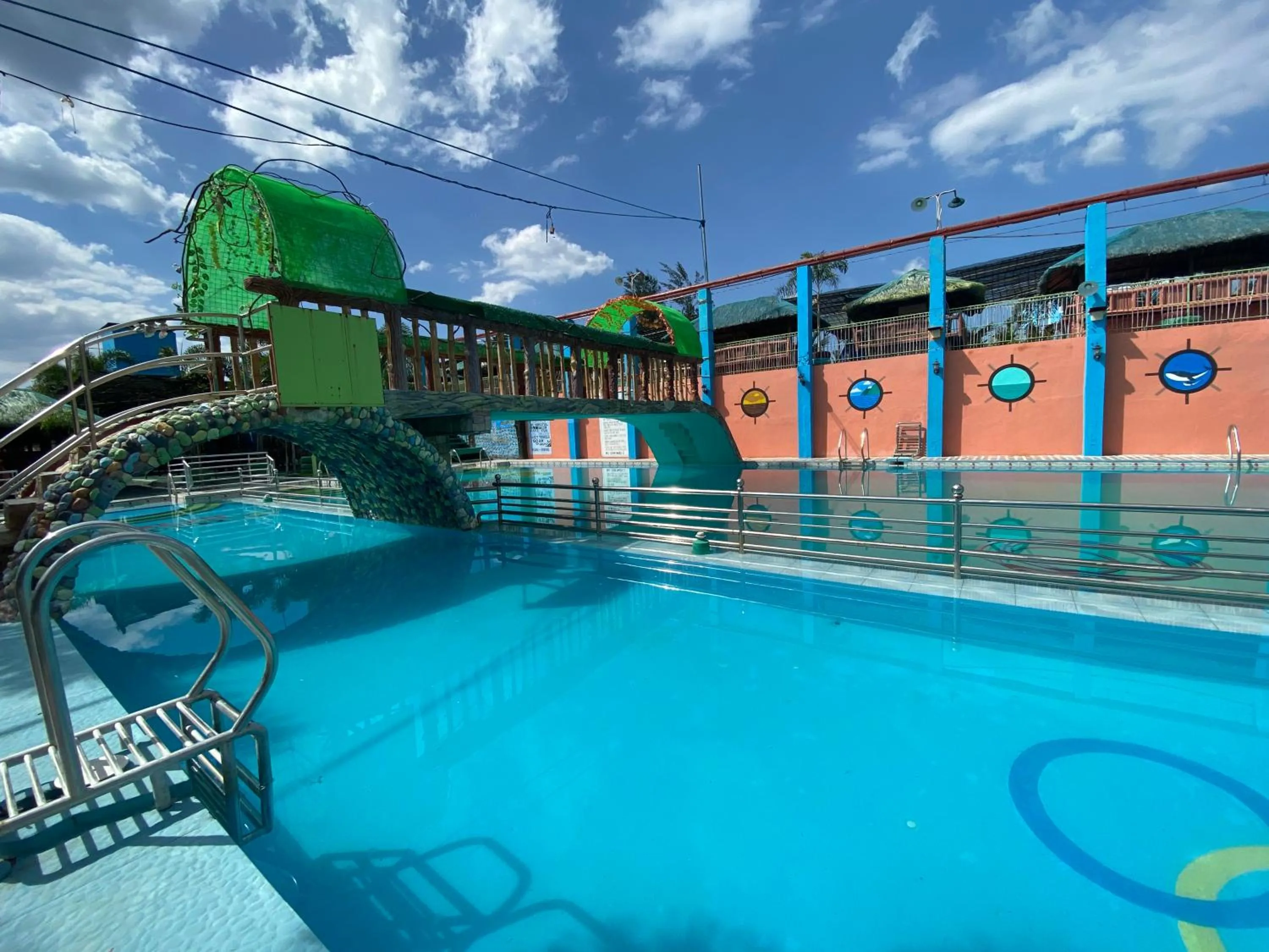 Swimming pool in RedDoorz Plus @ Lhexlyn Resort San Narciso