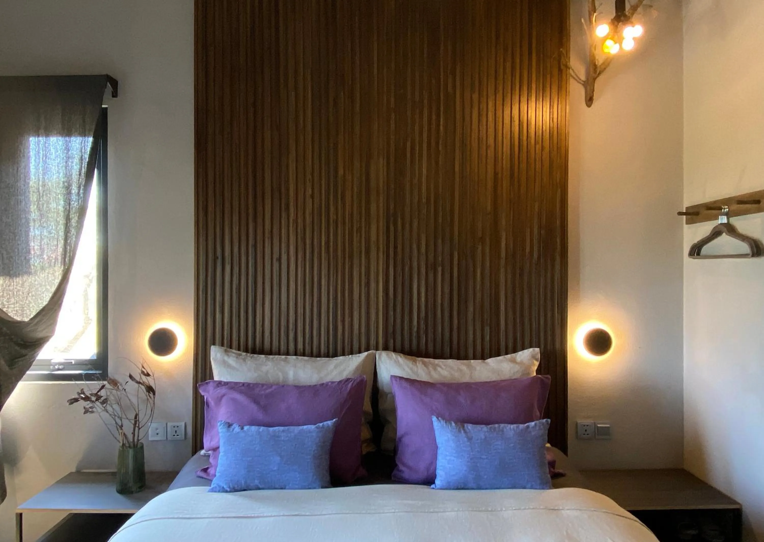 Bed in Kaia Gallery Hotel Hoi An