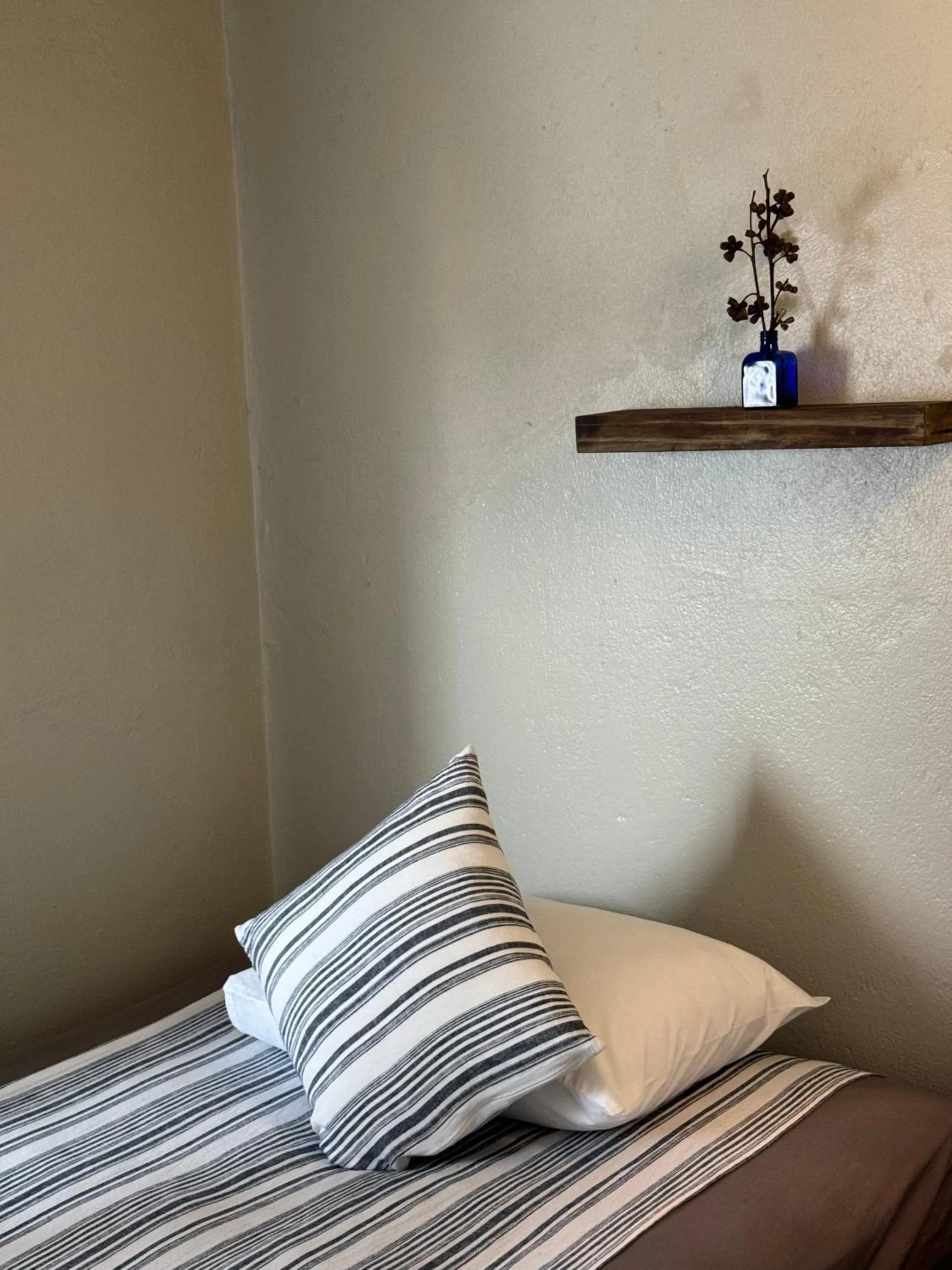 Bed in Kaia Gallery Hotel Hoi An