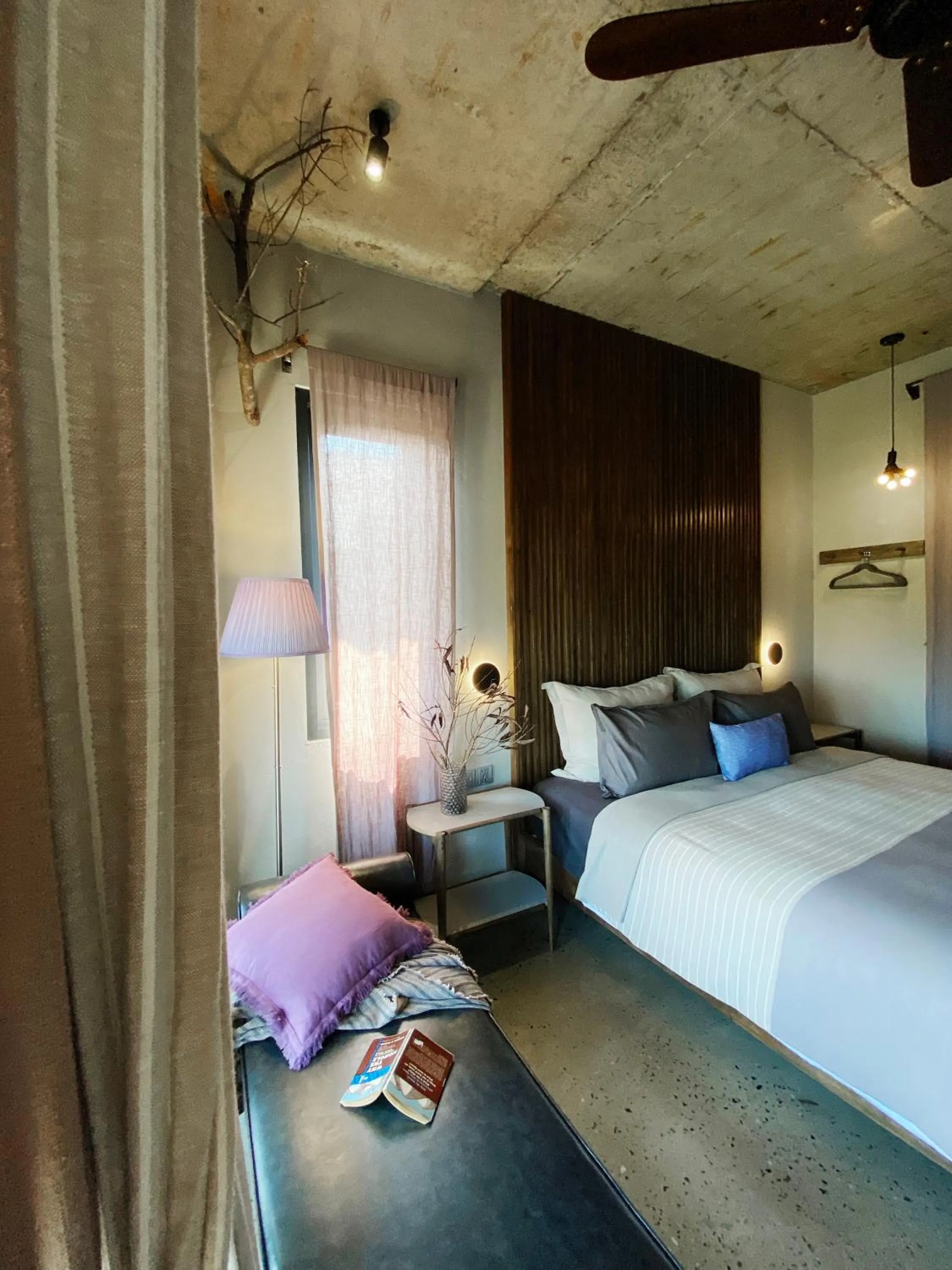 Bed in Kaia Gallery Hotel Hoi An