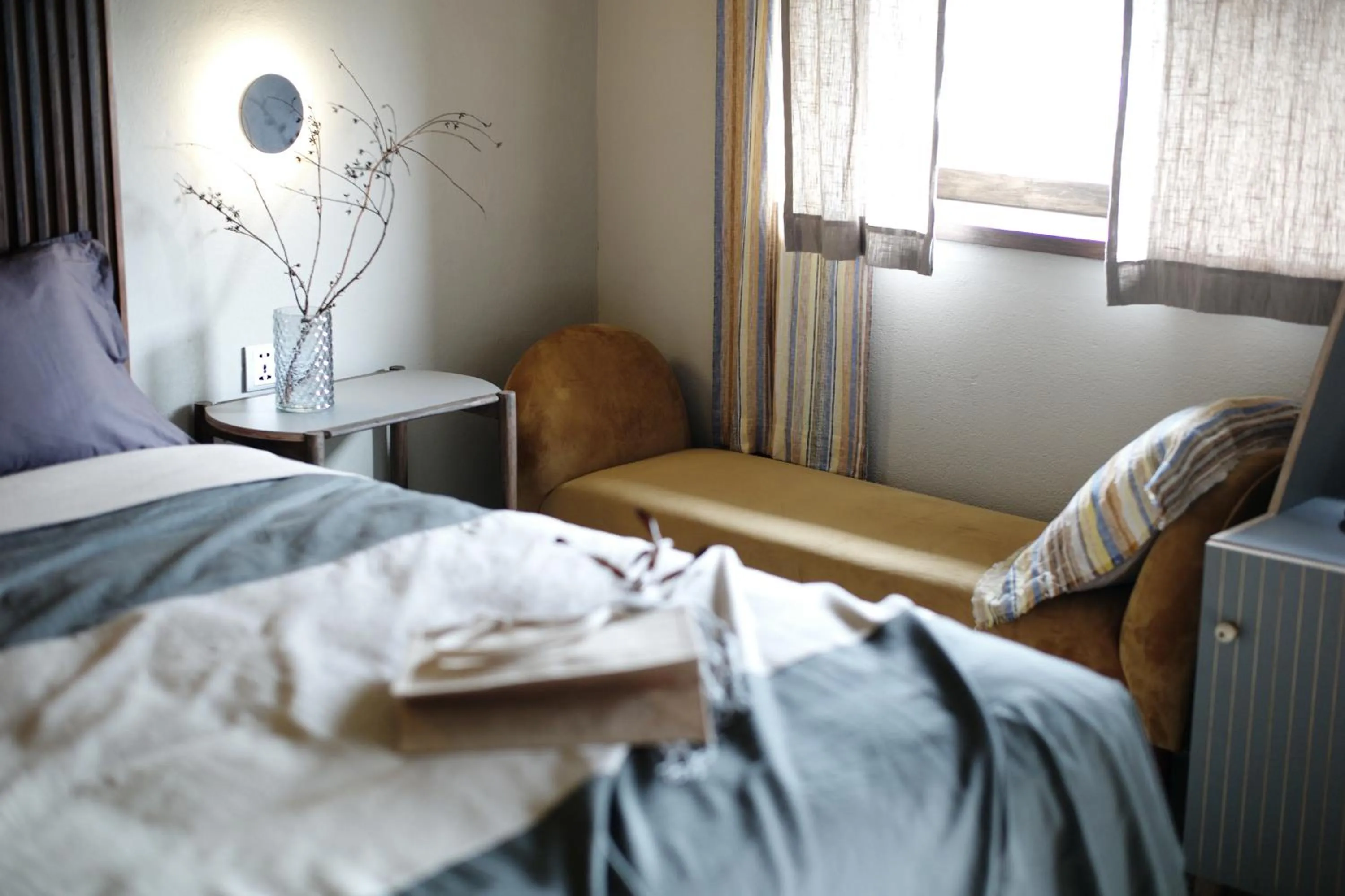 Bed in Kaia Gallery Hotel Hoi An