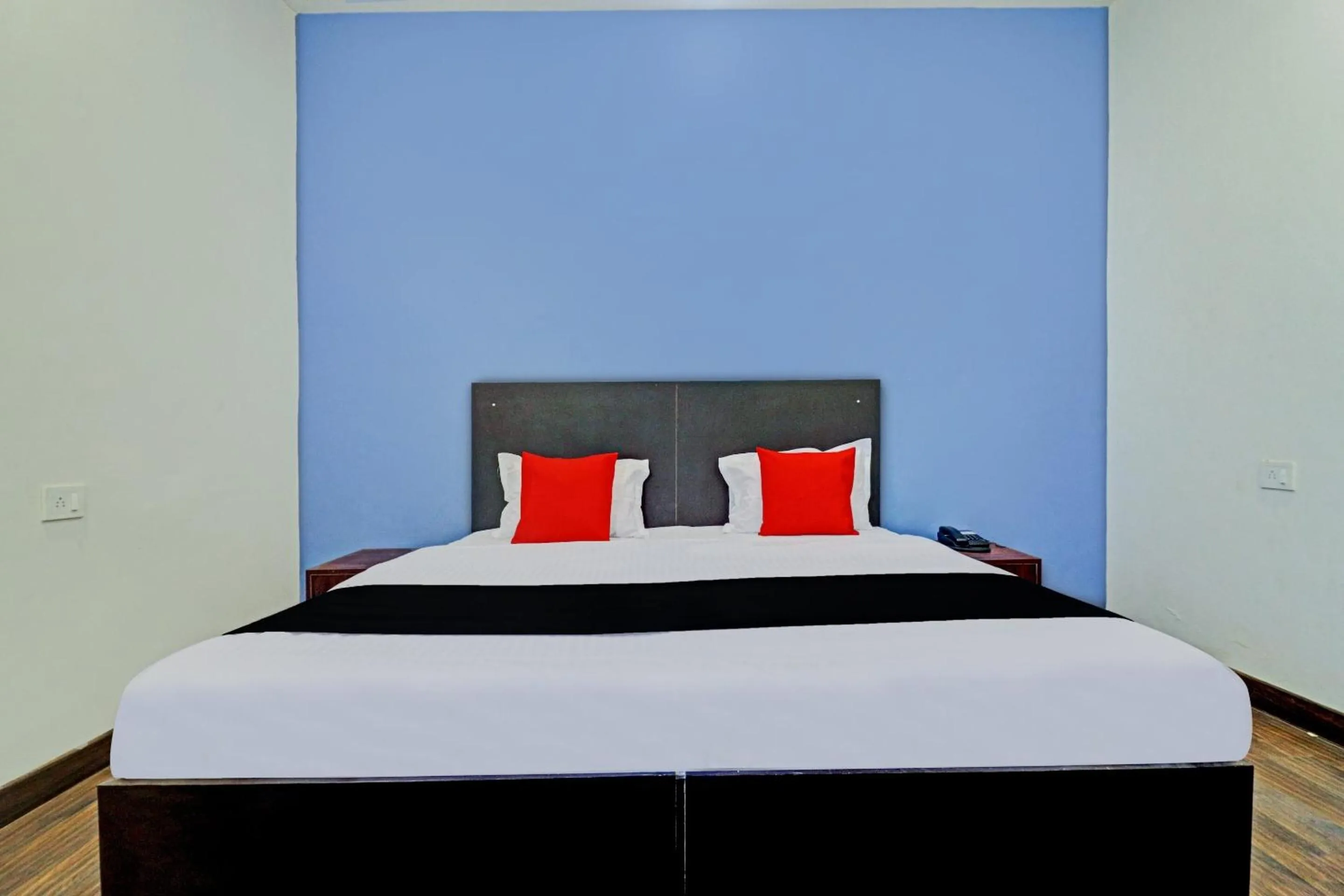 Bedroom in Capital O Kanha Resort