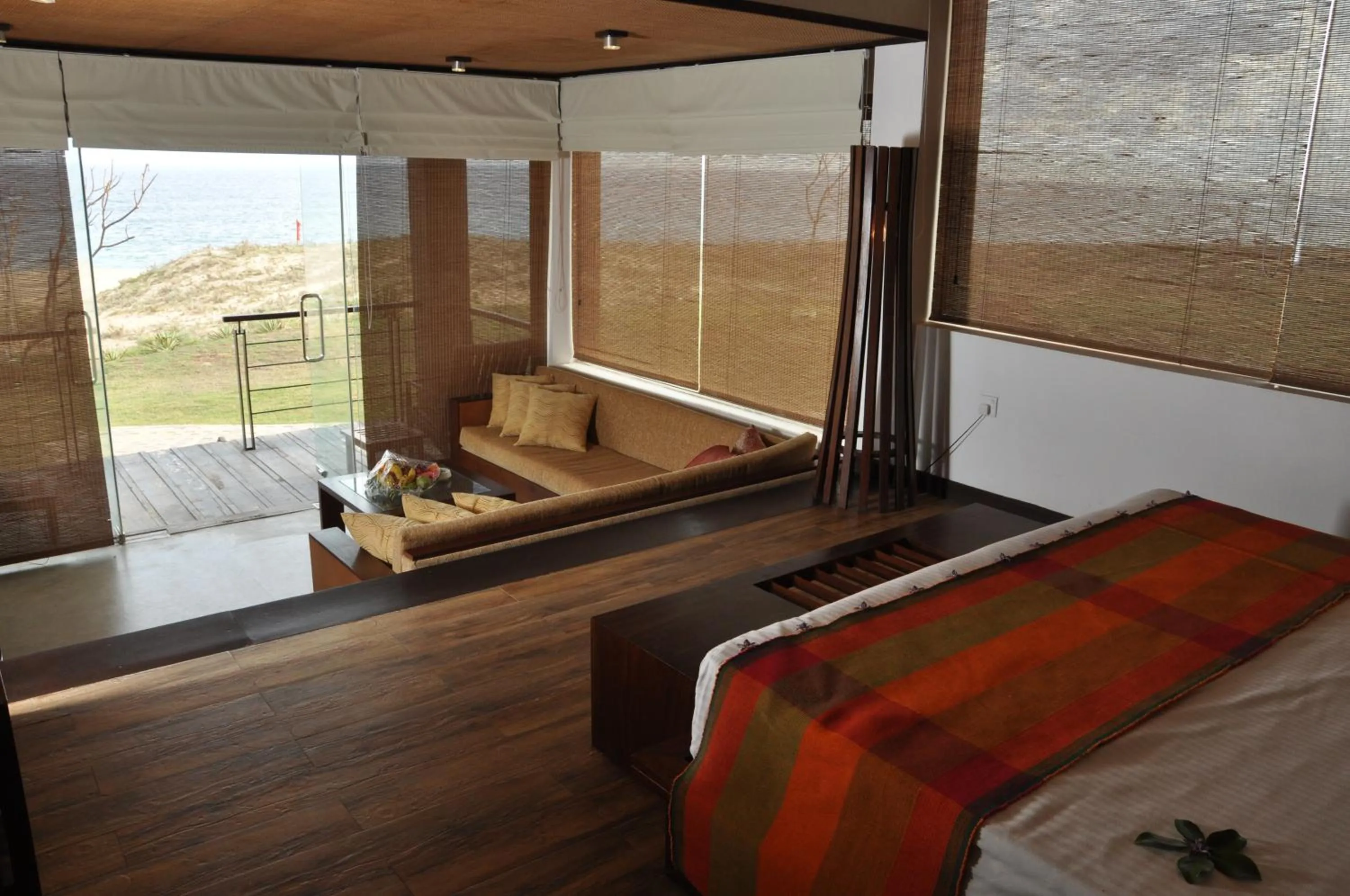 Living room, Bed in Laya Safari Resorts & Spa