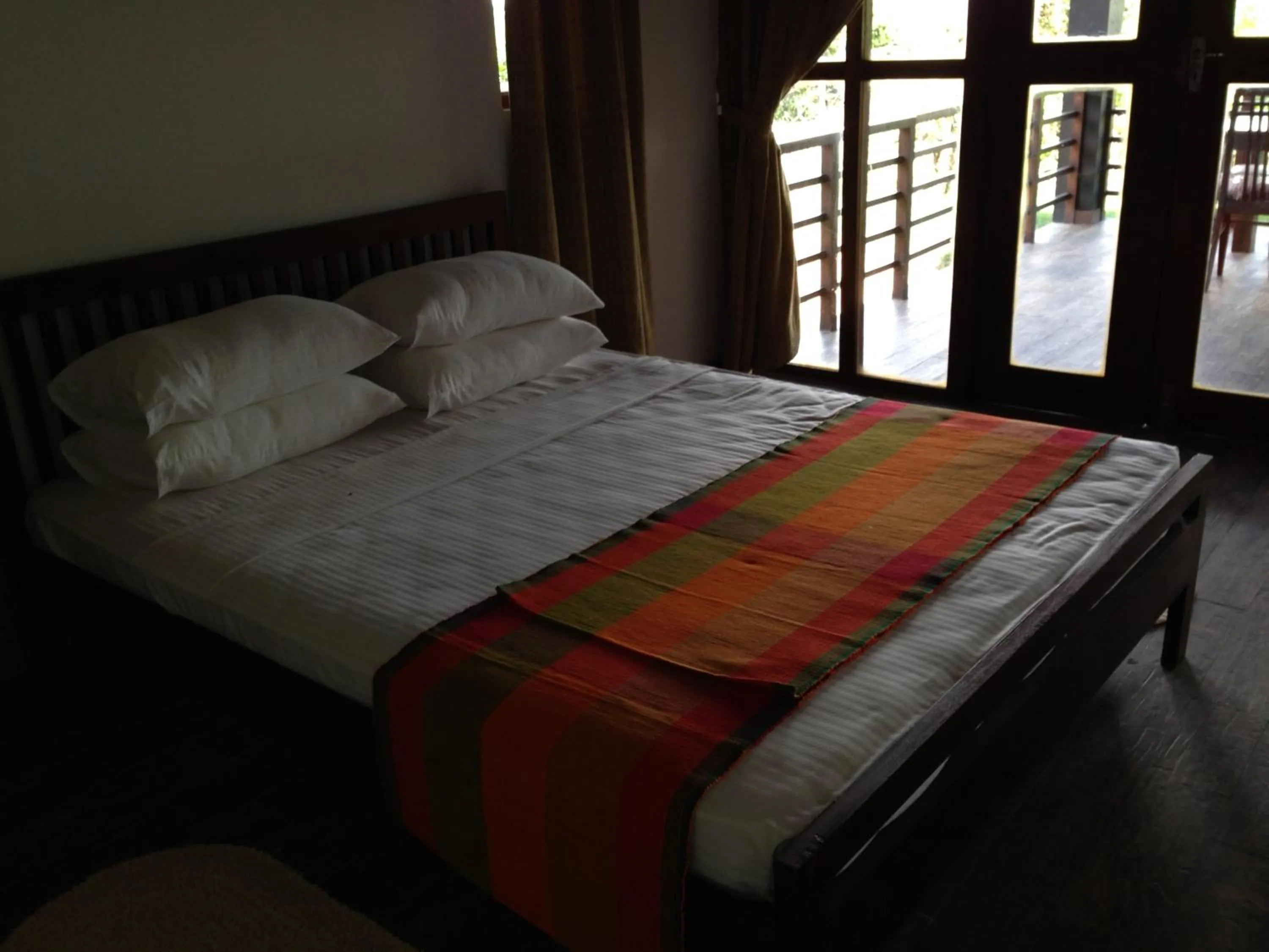 Bed in Laya Safari Resorts & Spa