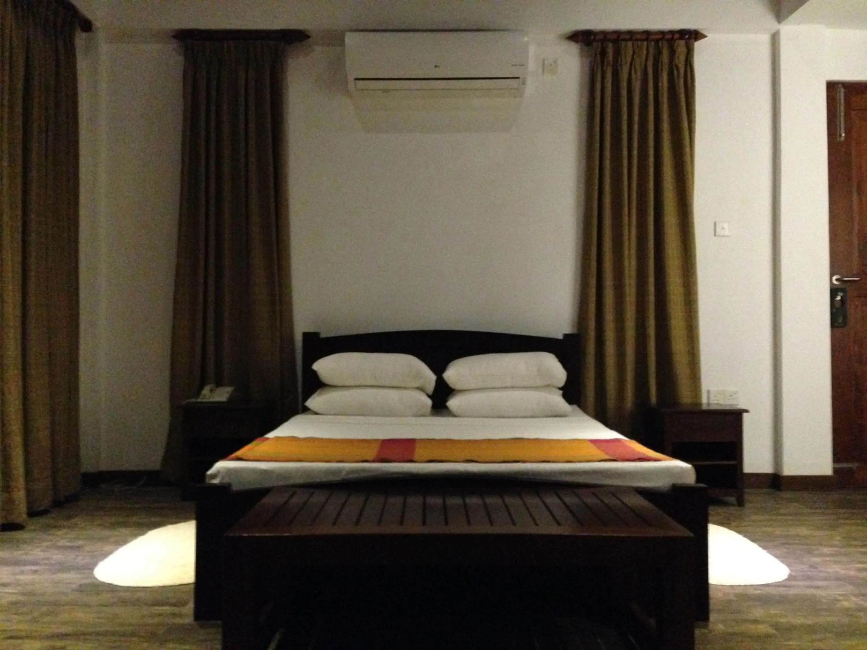 Bed in Laya Safari Resorts & Spa