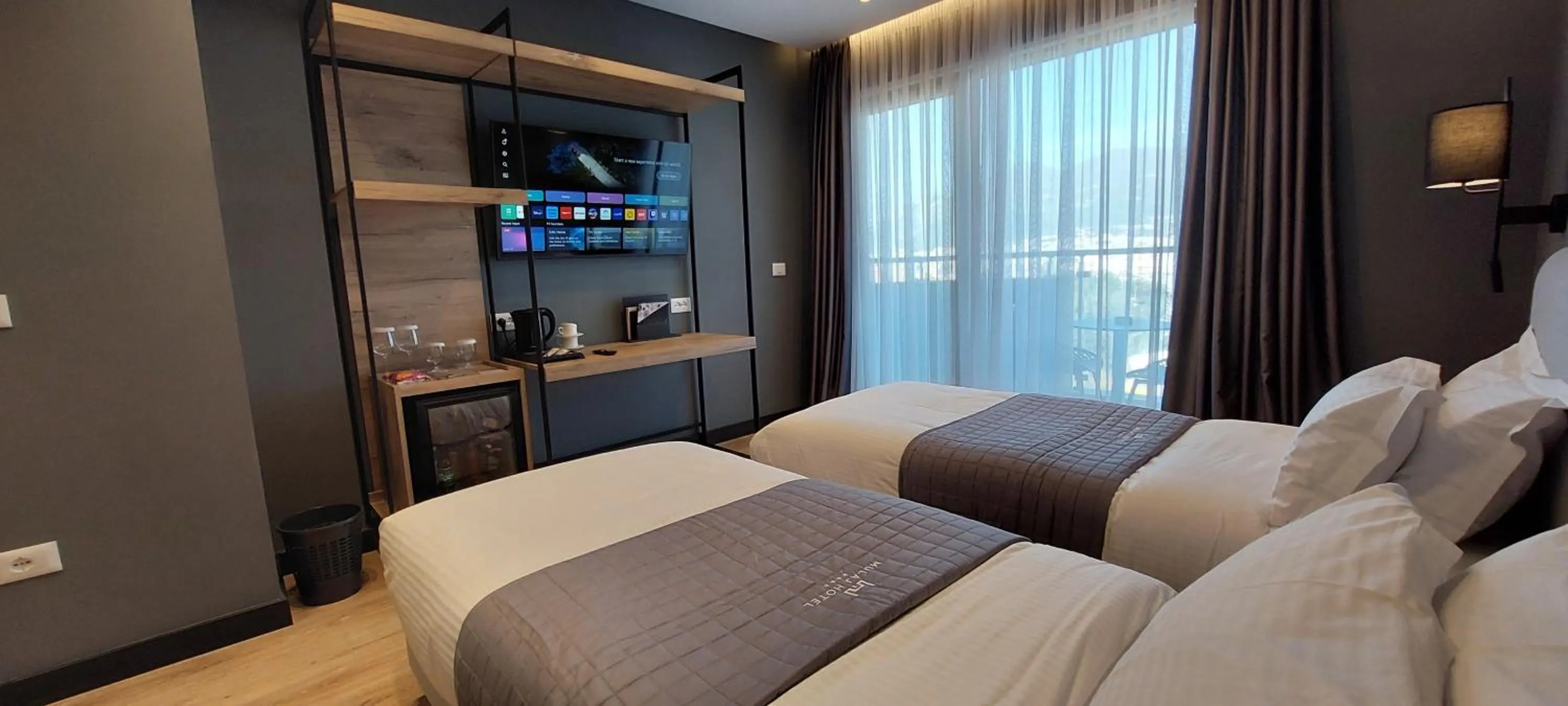 View (from property/room), Bed in Mulaj Hotel