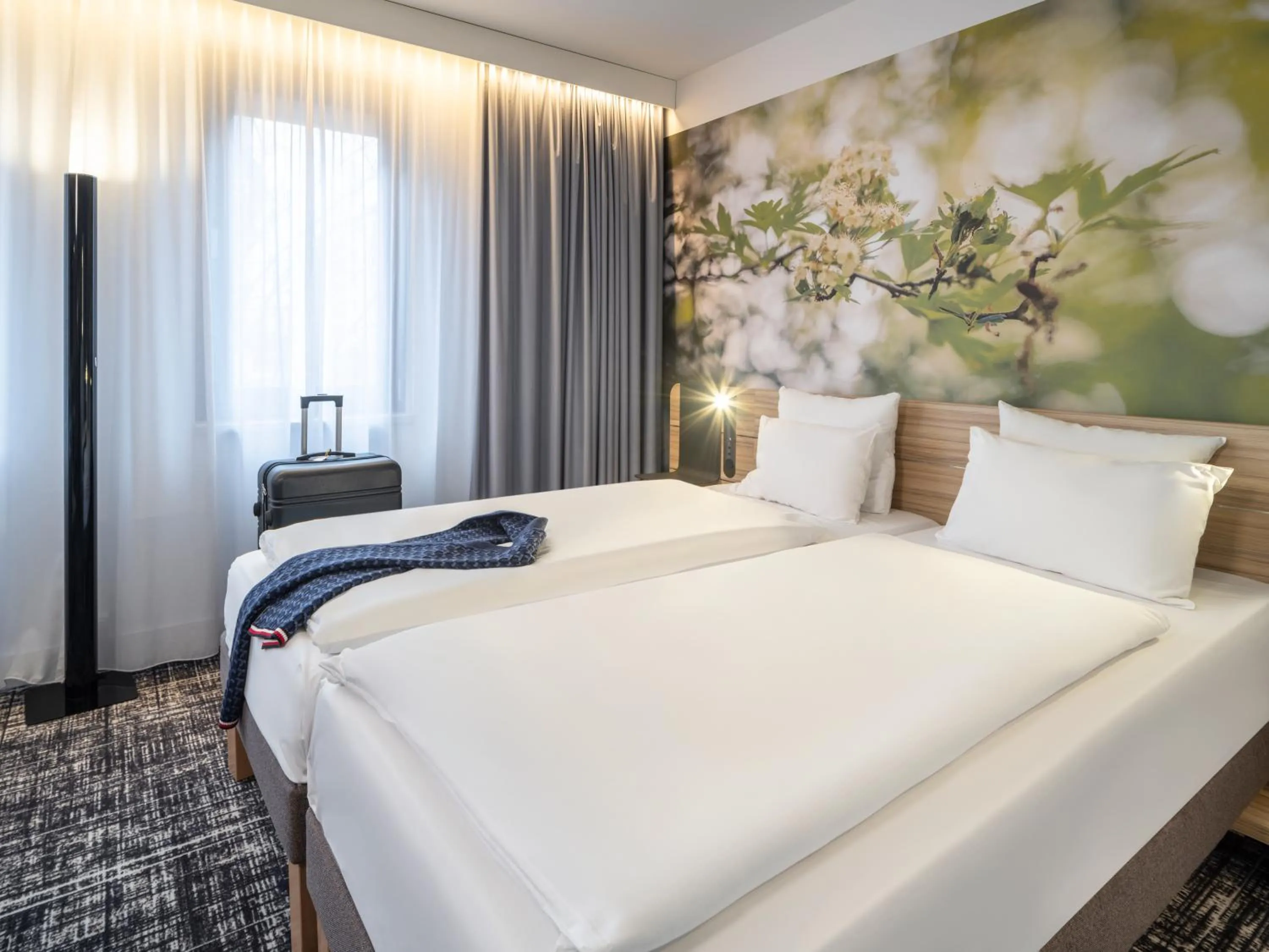 Bed in Novotel Suites Wien City Donau