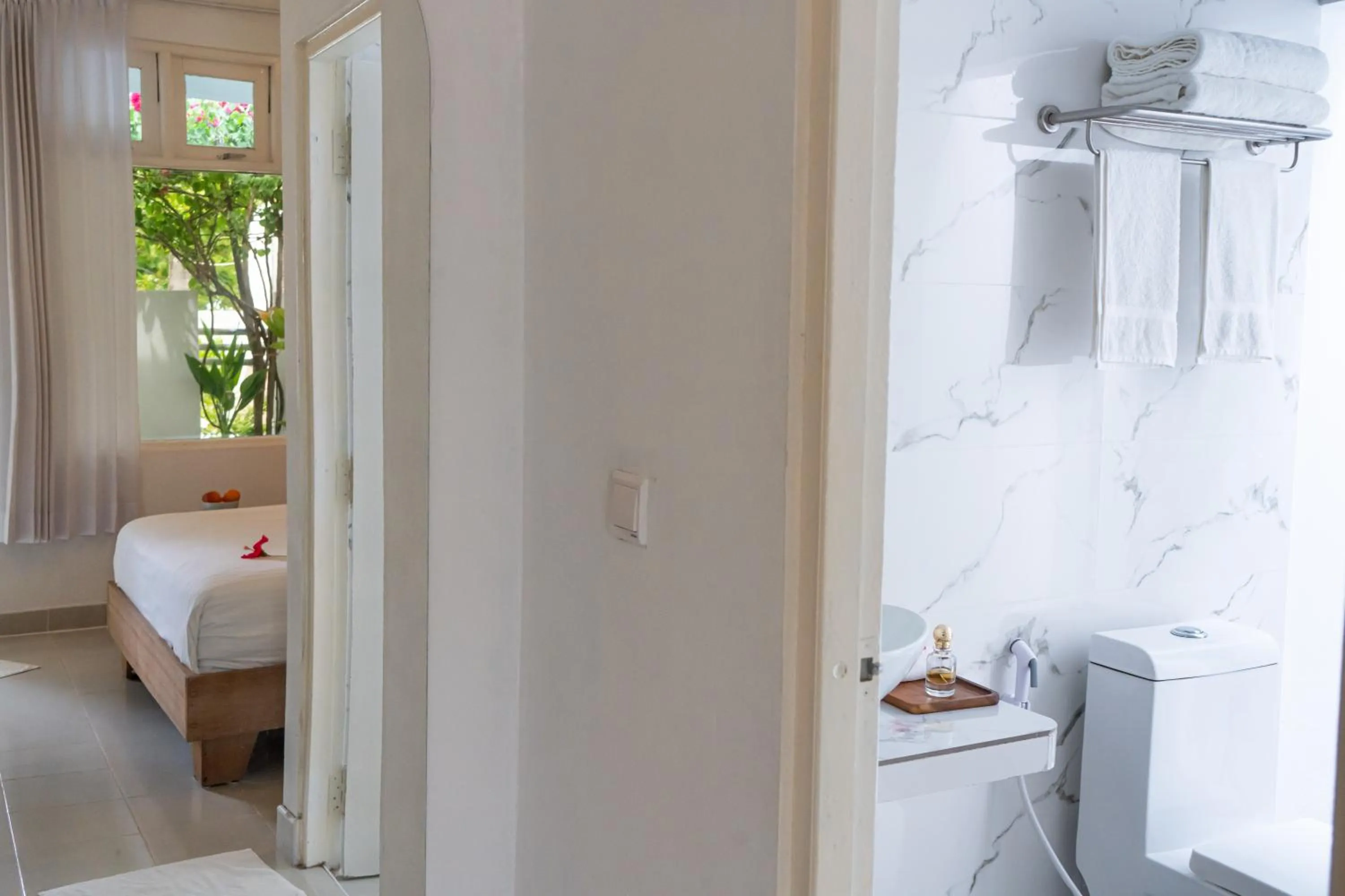 Bed in Vaali Maldives Island Escapes & Dive