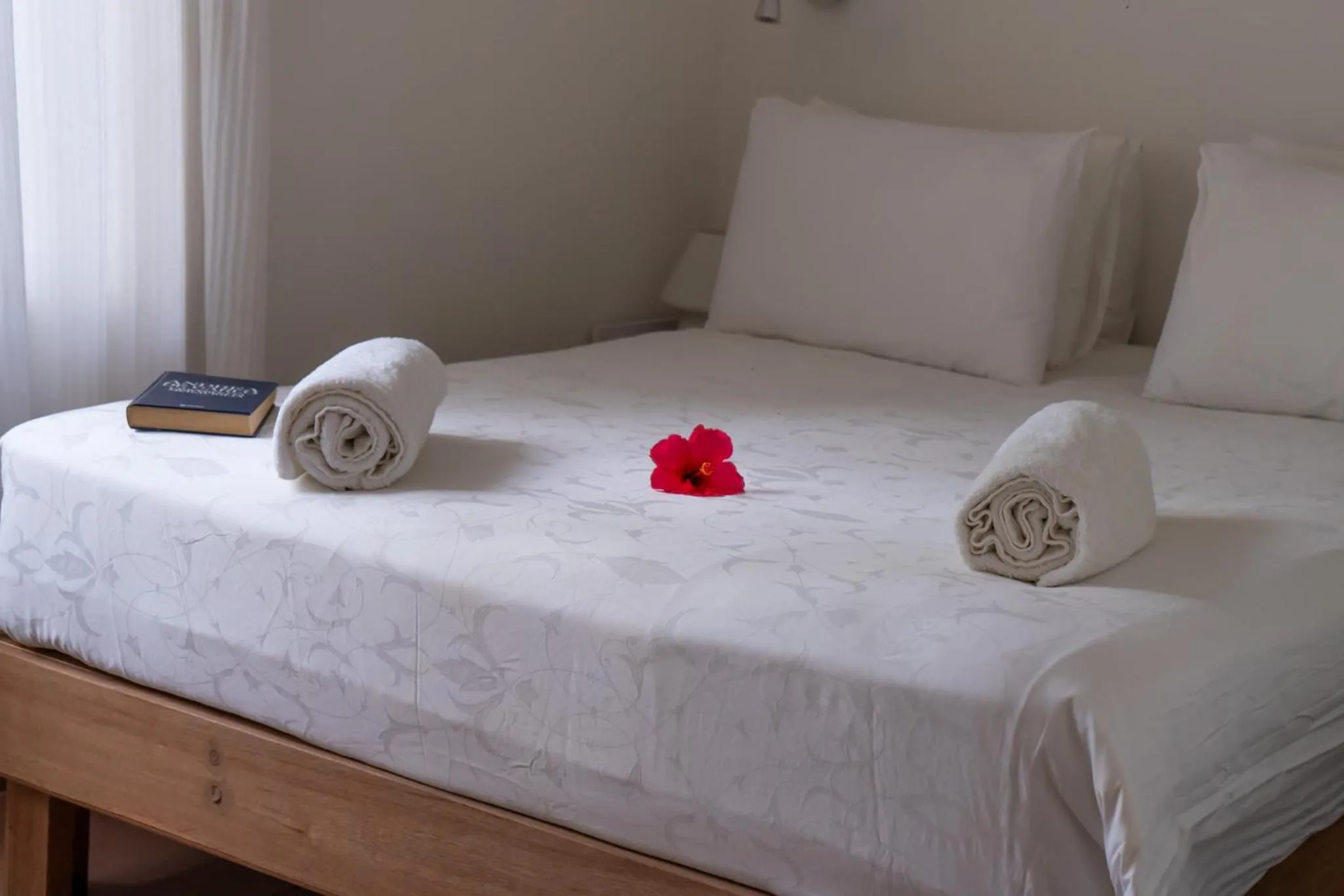 Bed in Vaali Maldives Island Escapes & Dive