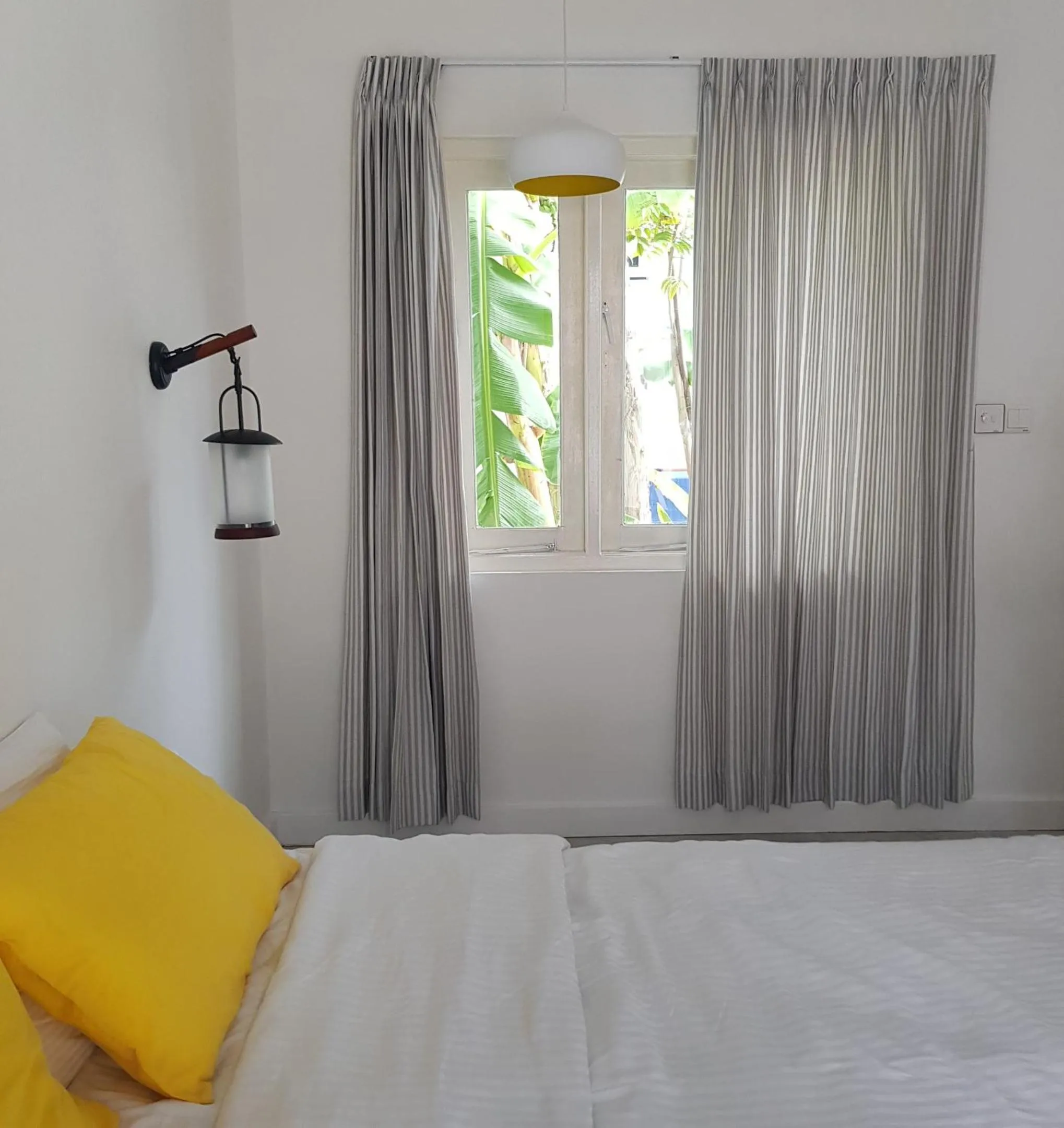 Bed in Vaali Maldives Island Escapes & Dive