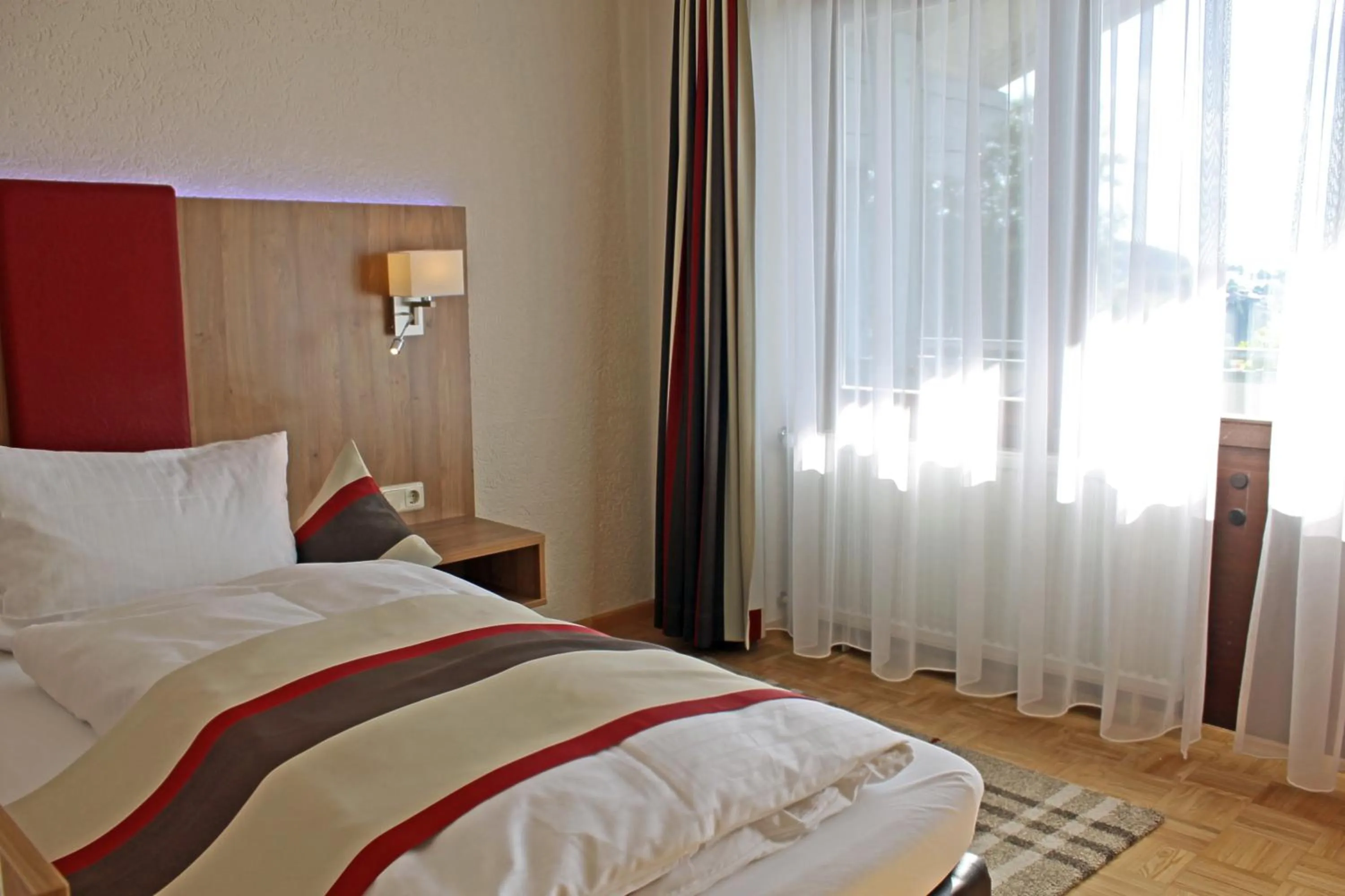 Photo of the whole room, Bed in Genusshotel "Zum Wendl"