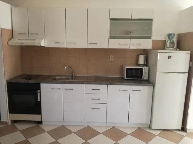 Kitchen or kitchenette in Apartments Klanac