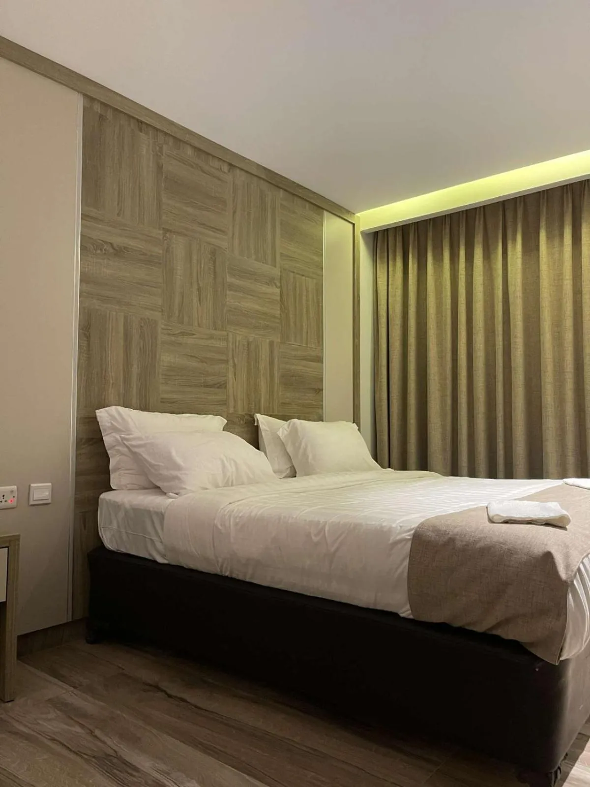 Bed in Mass Paradise Hotel