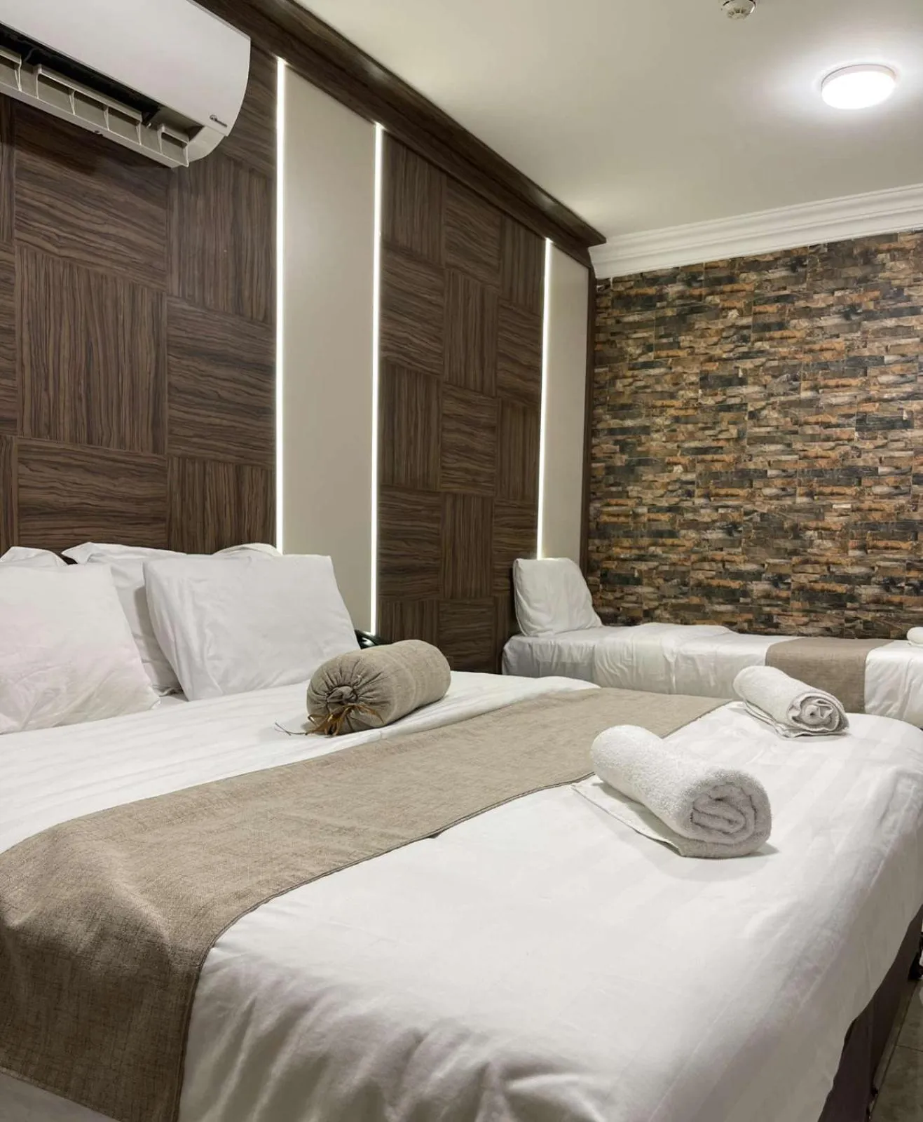 Bed in Mass Paradise Hotel