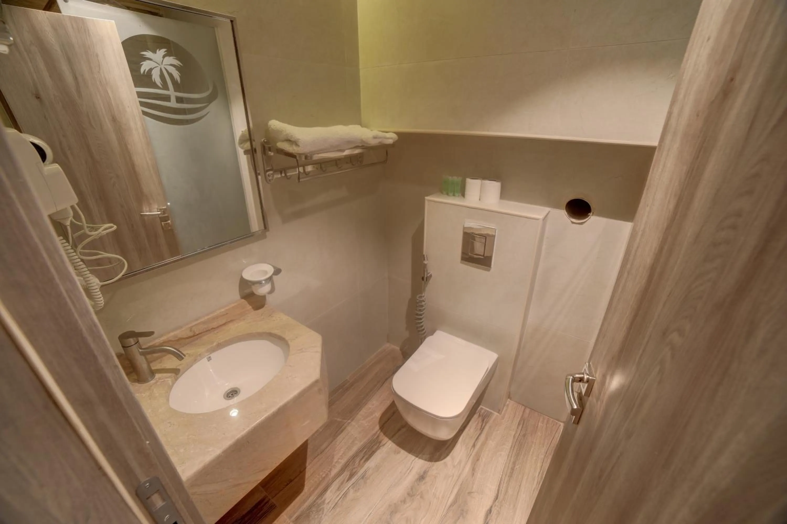 Toilet in Mass Paradise Hotel