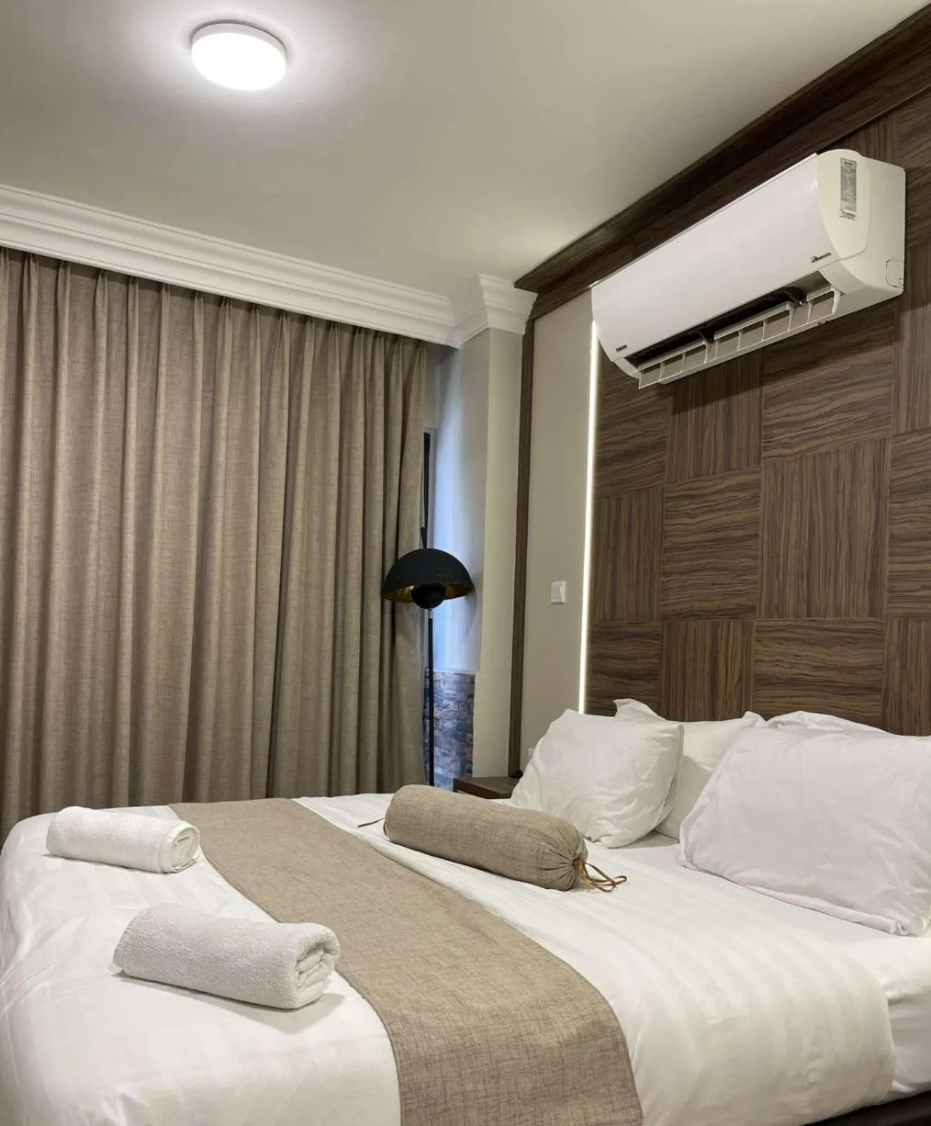 Bed in Mass Paradise Hotel