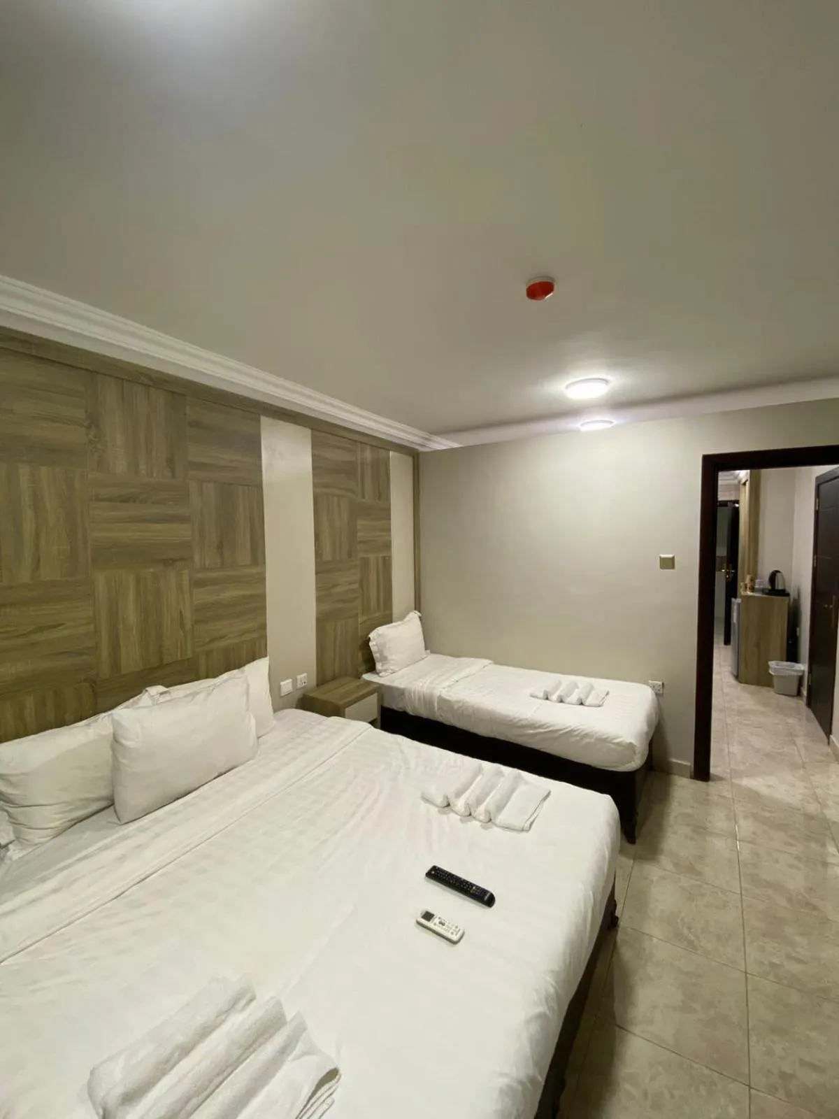 Bed in Mass Paradise Hotel