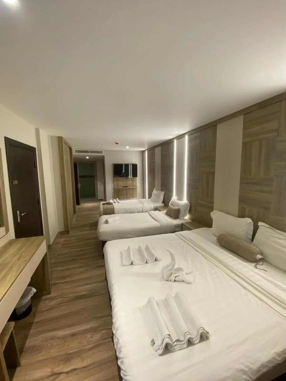 Bed in Mass Paradise Hotel