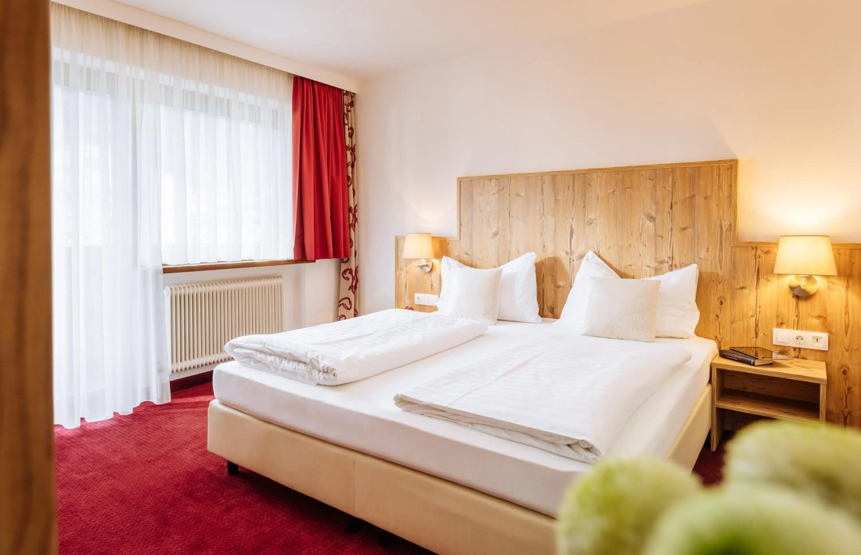 Bedroom, Bed in Hotel Kögele bei Innsbruck Axamer Lizum