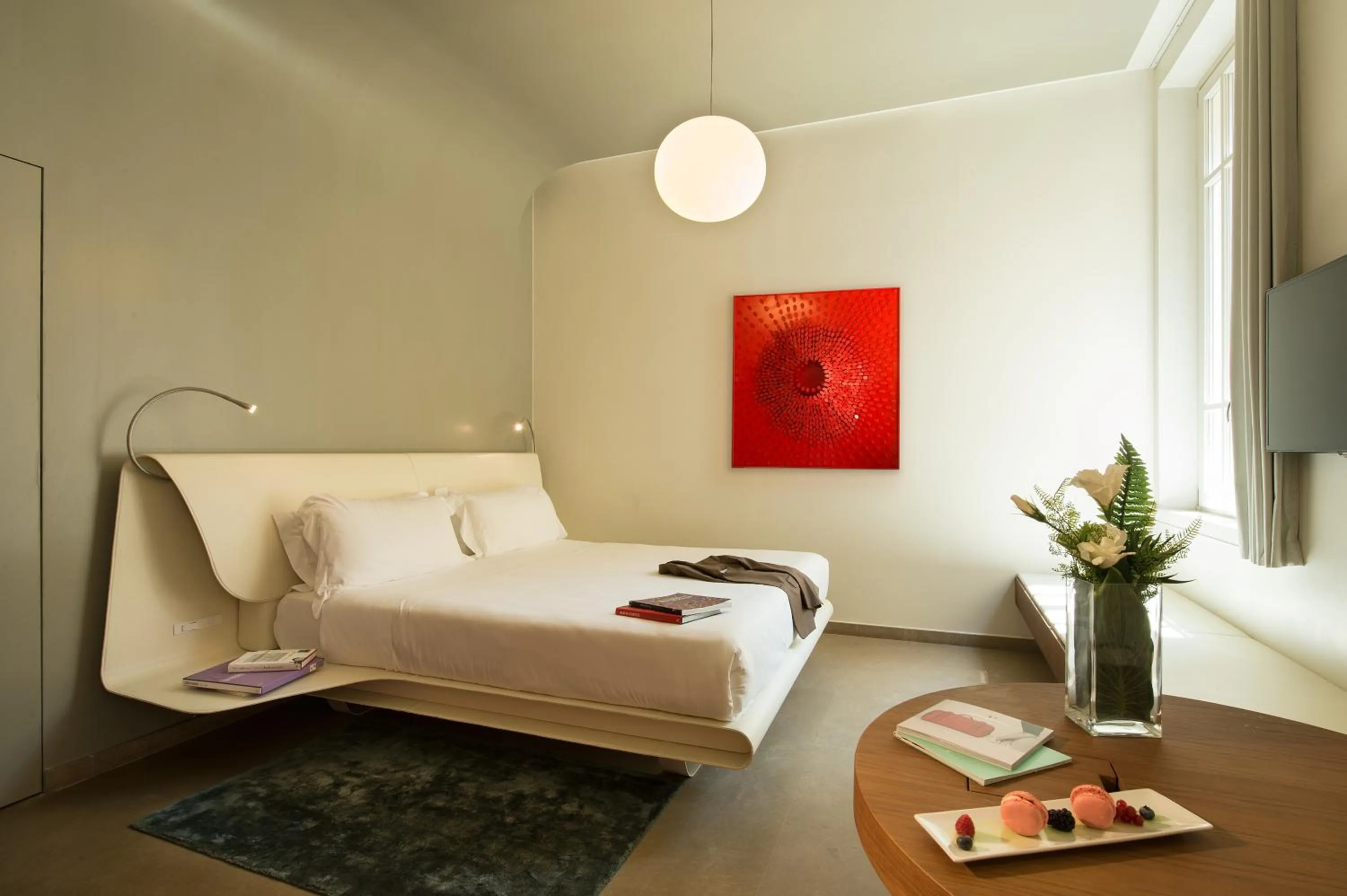 Bed in Palazzo Montemartini Rome, A Radisson Collection Hotel