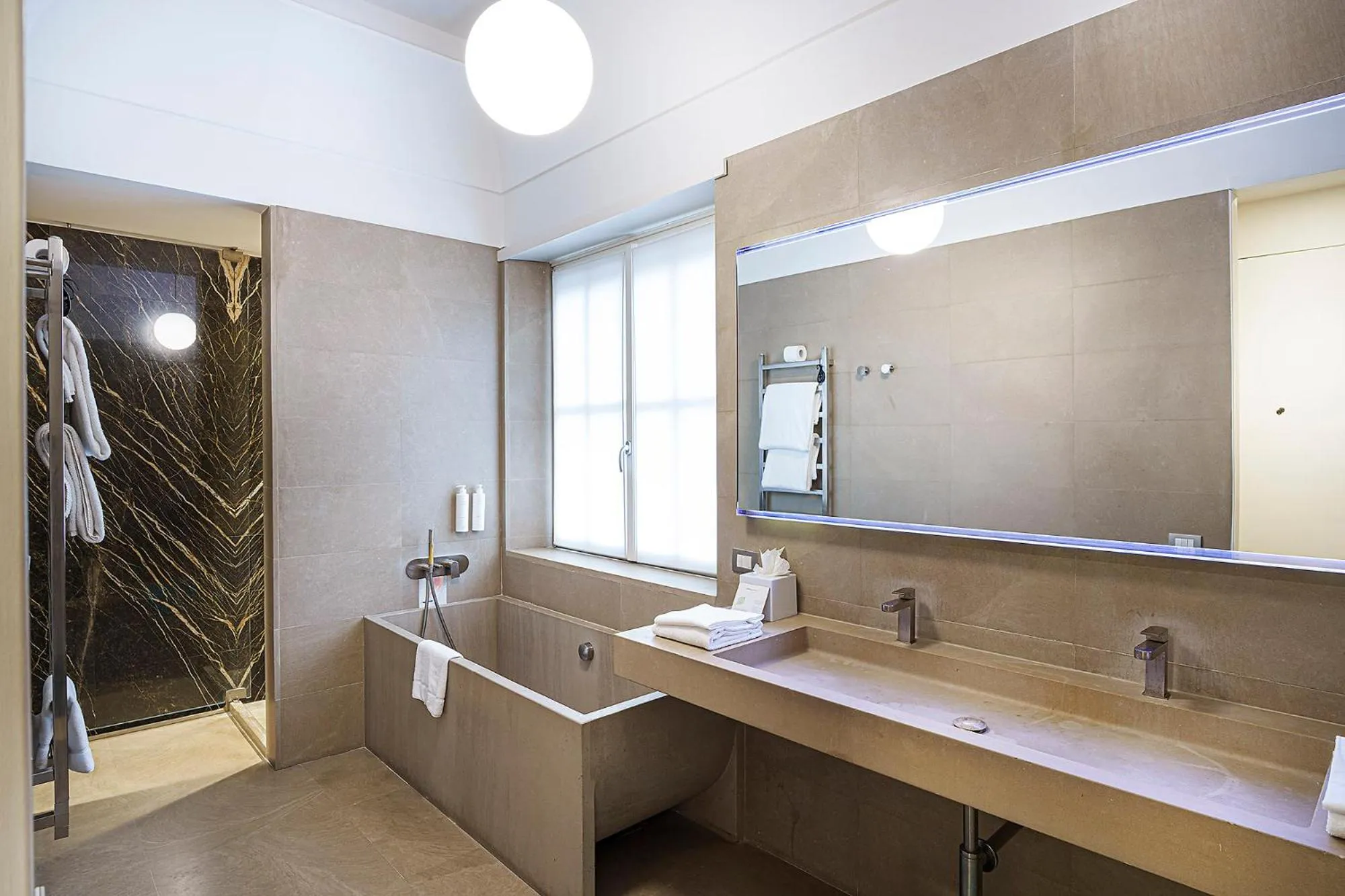 Bathroom in Palazzo Montemartini Rome, A Radisson Collection Hotel