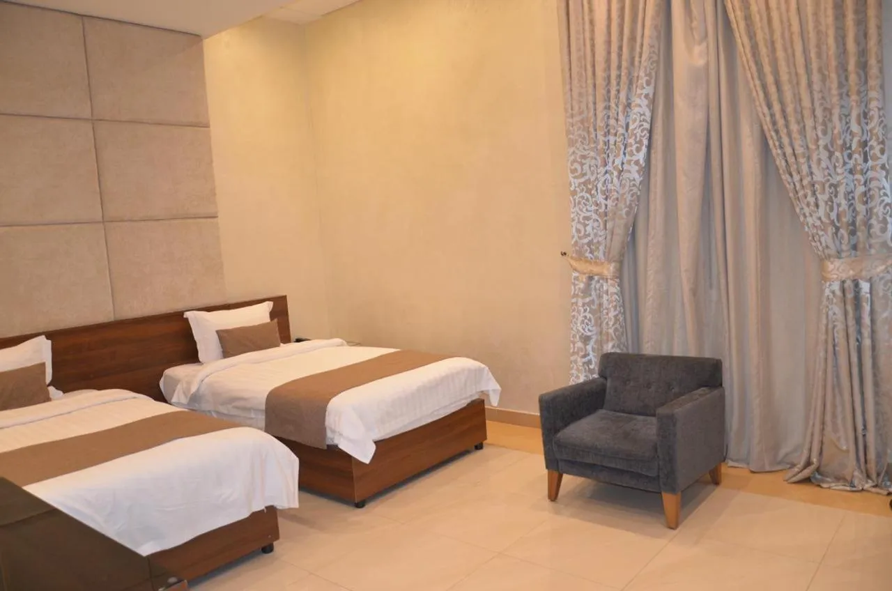 Bed in Mandarin Alshamal Hotel Apartments