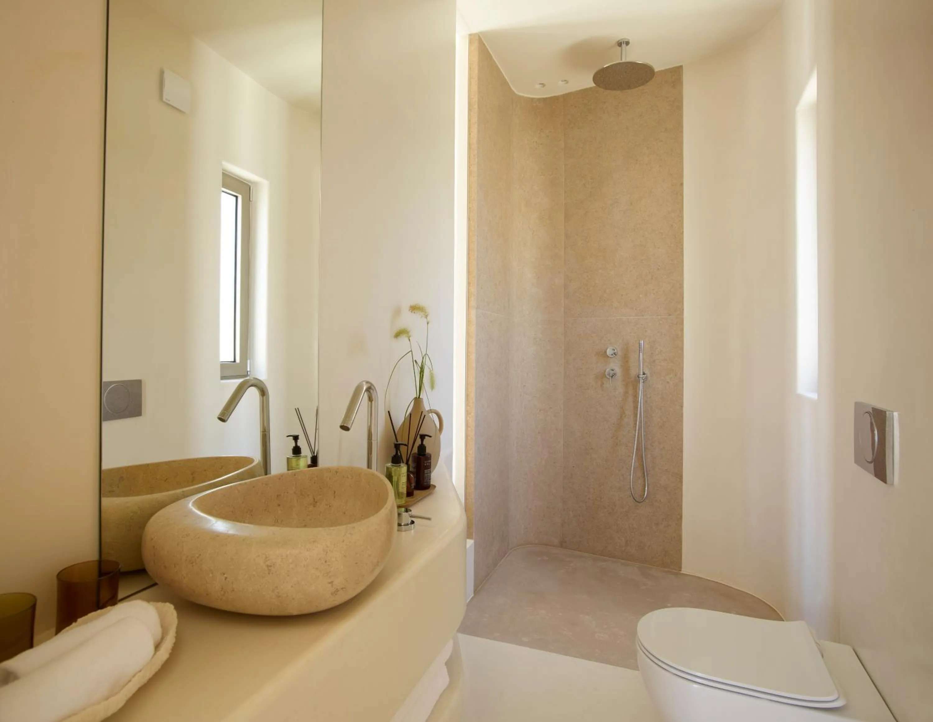 Bathroom in White Pebble Suites