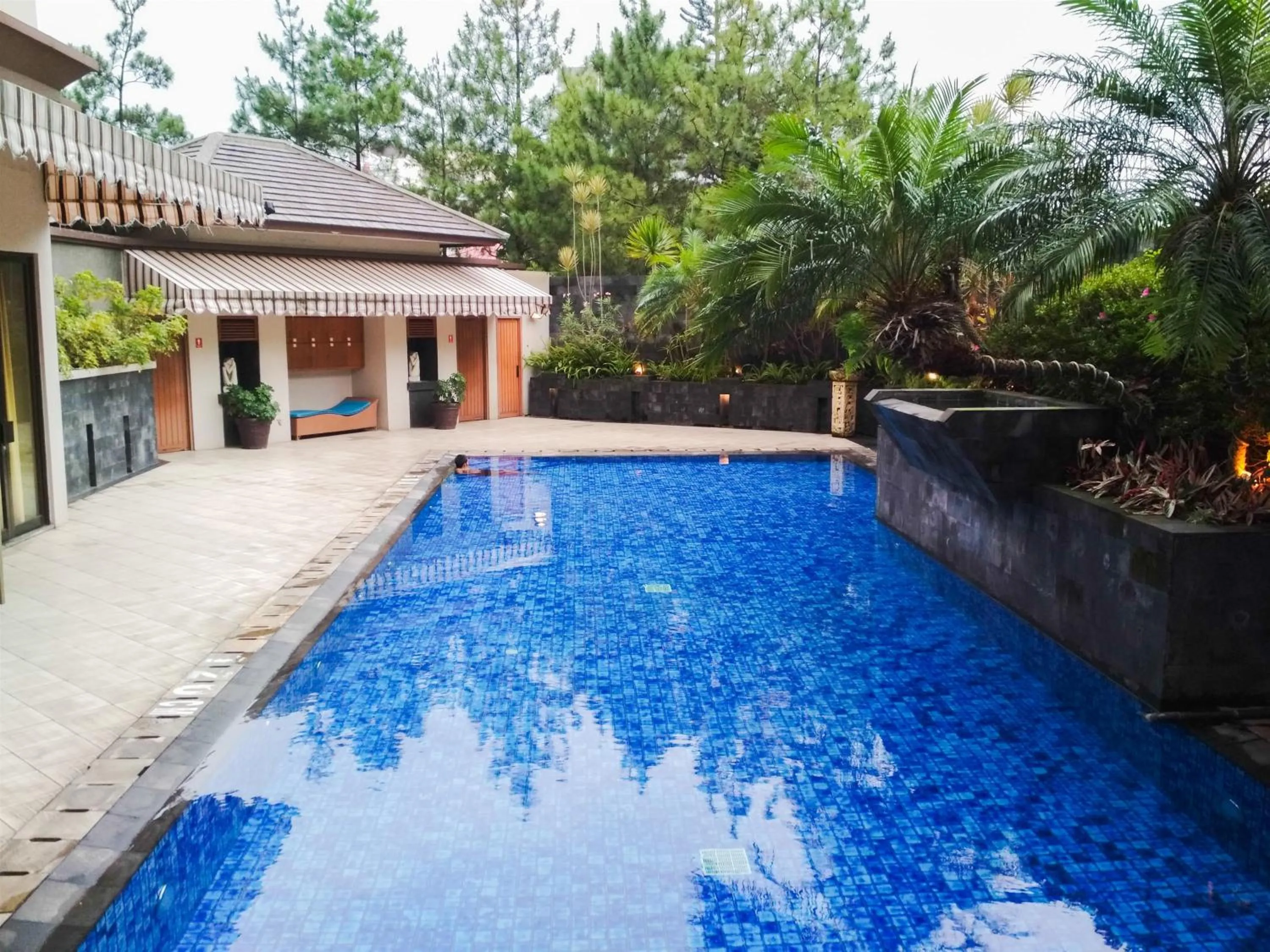 Swimming pool in Homey 2BR Majesty Apartment near Maranatha University By Travelio