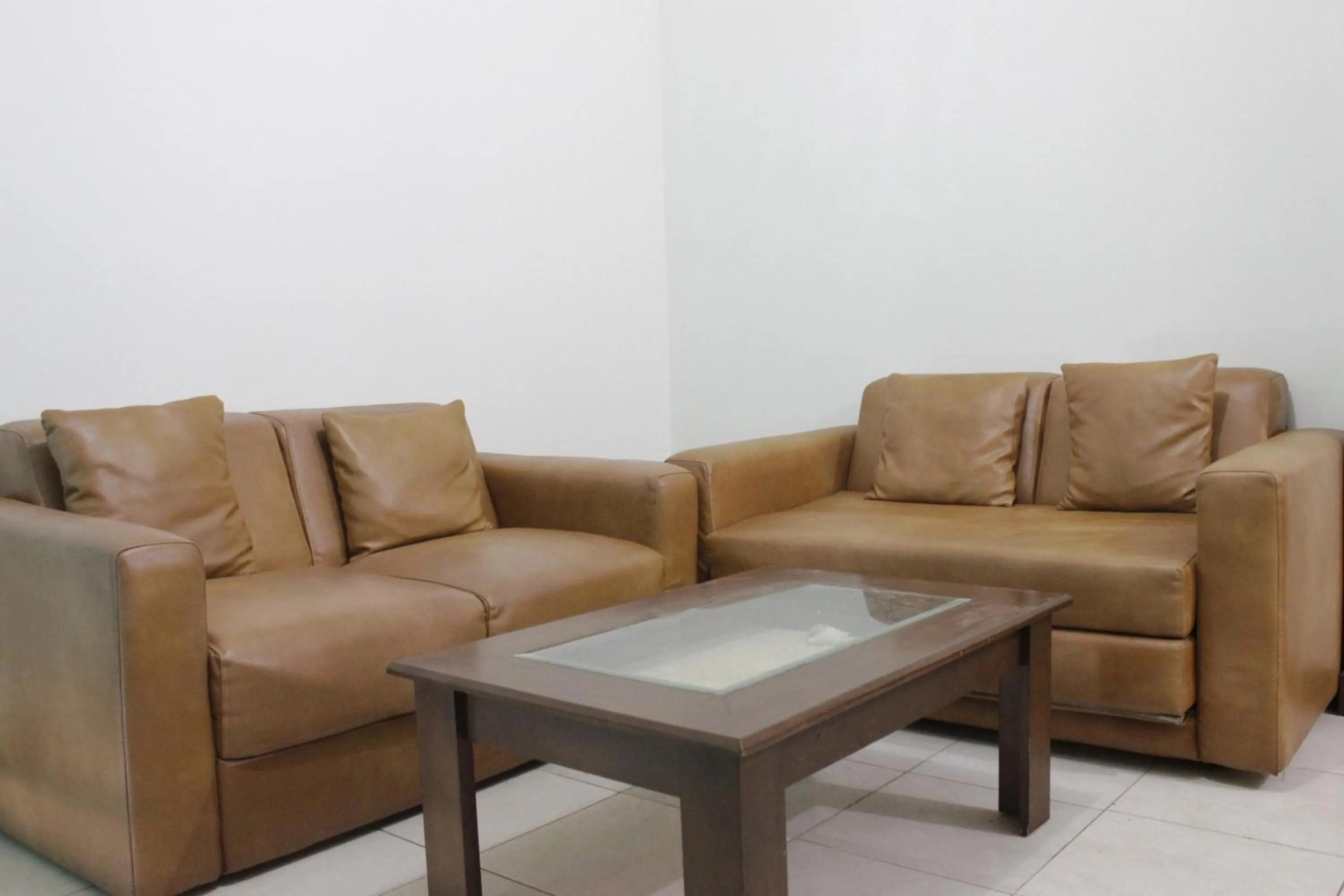 Living room in Homey 2BR Majesty Apartment near Maranatha University By Travelio