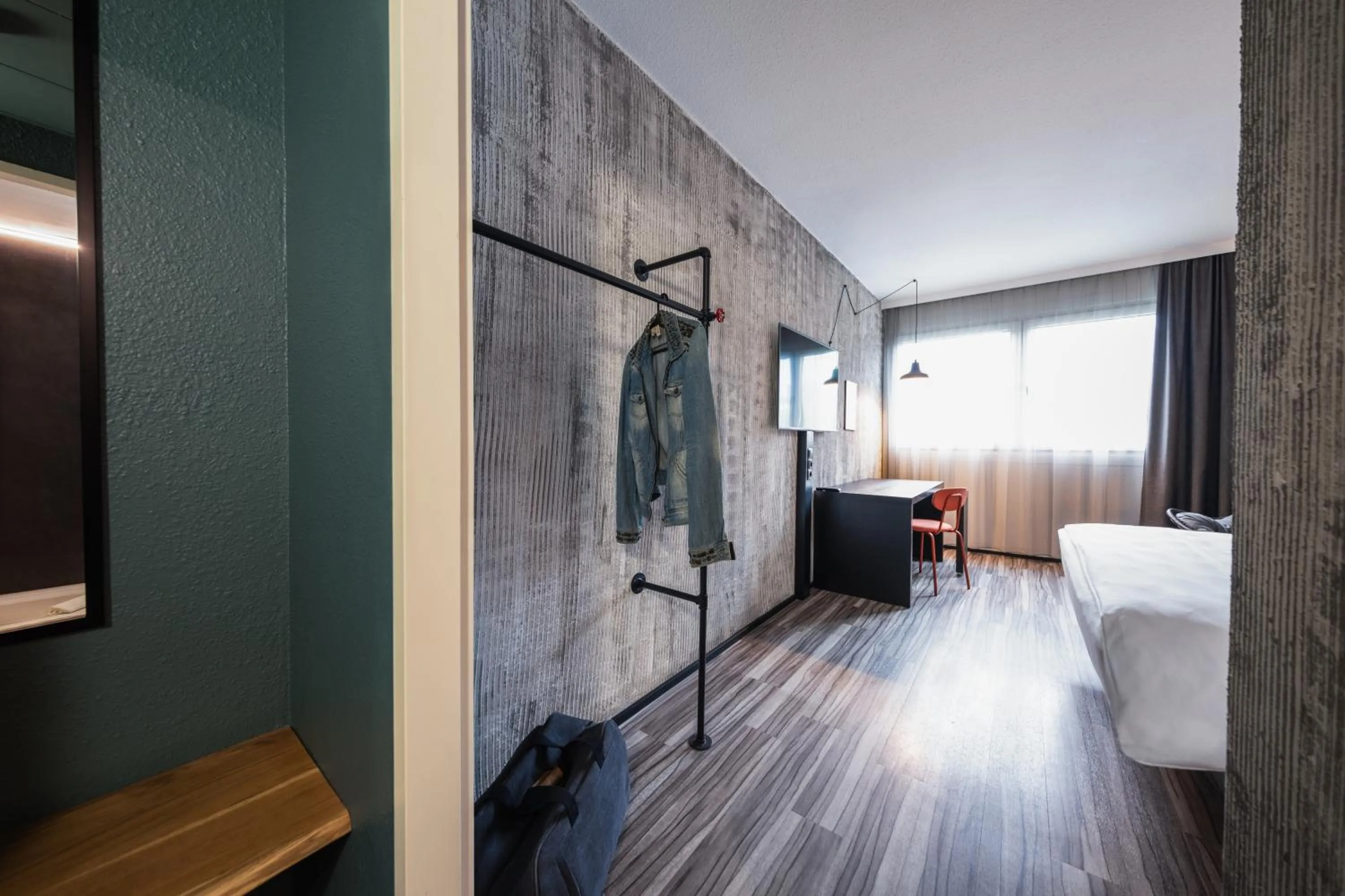 Photo of the whole room in Ibis Styles Linz