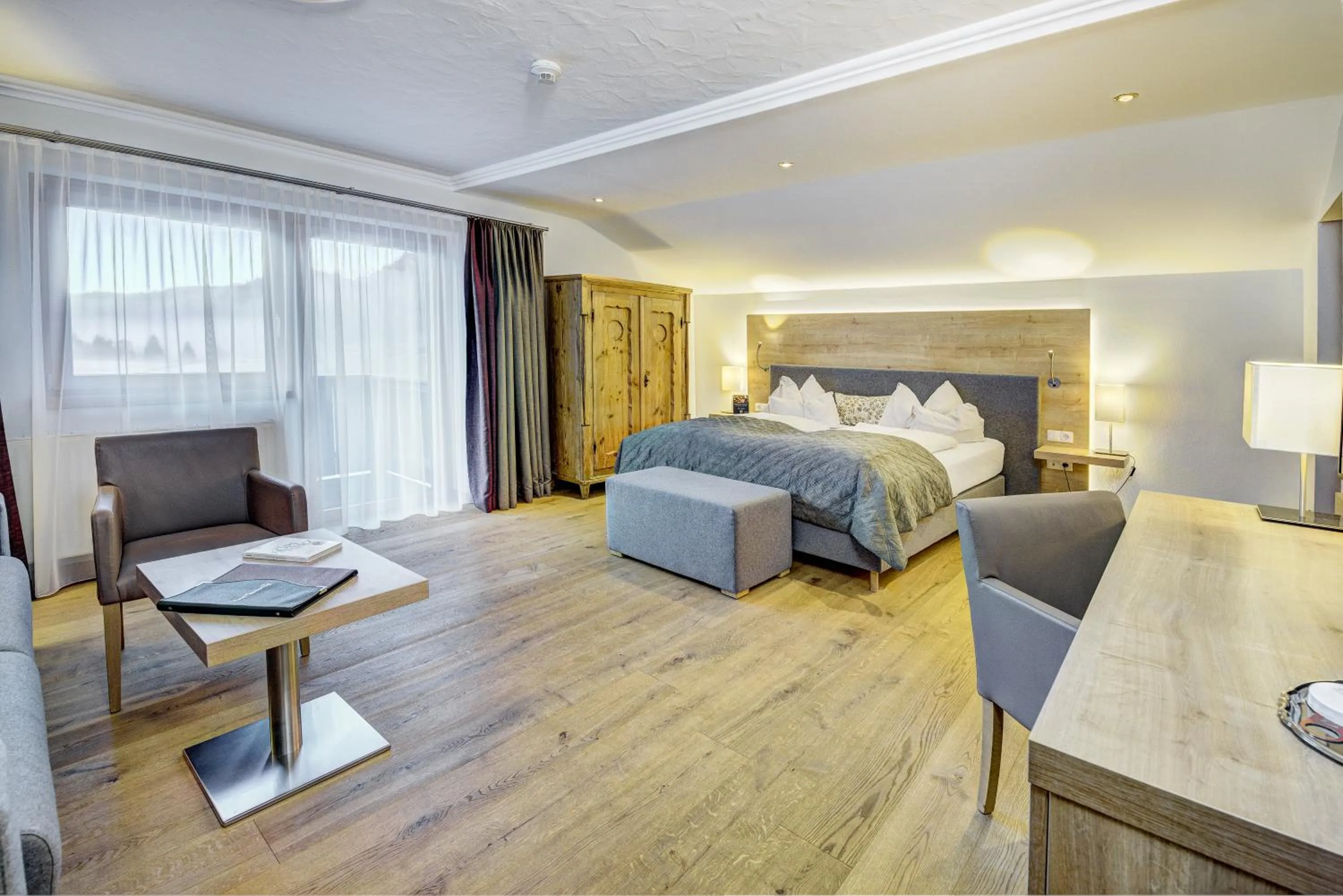 Seating area, Bed in Hotel Unterhof