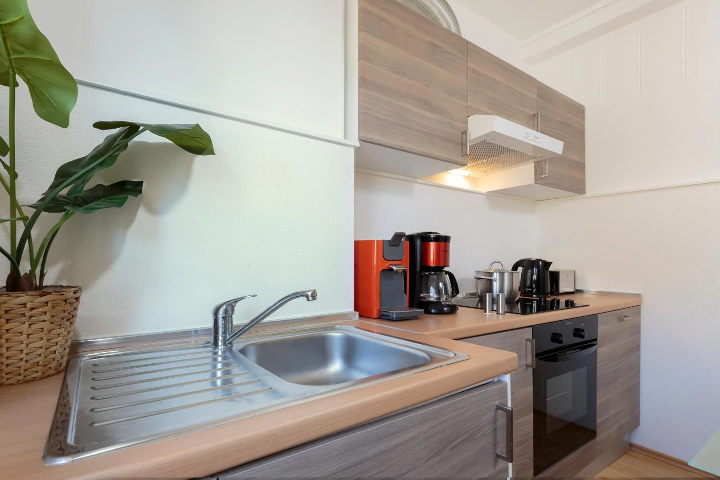 Kitchen or kitchenette in The Queen Luxury Apartments - Villa Carlotta