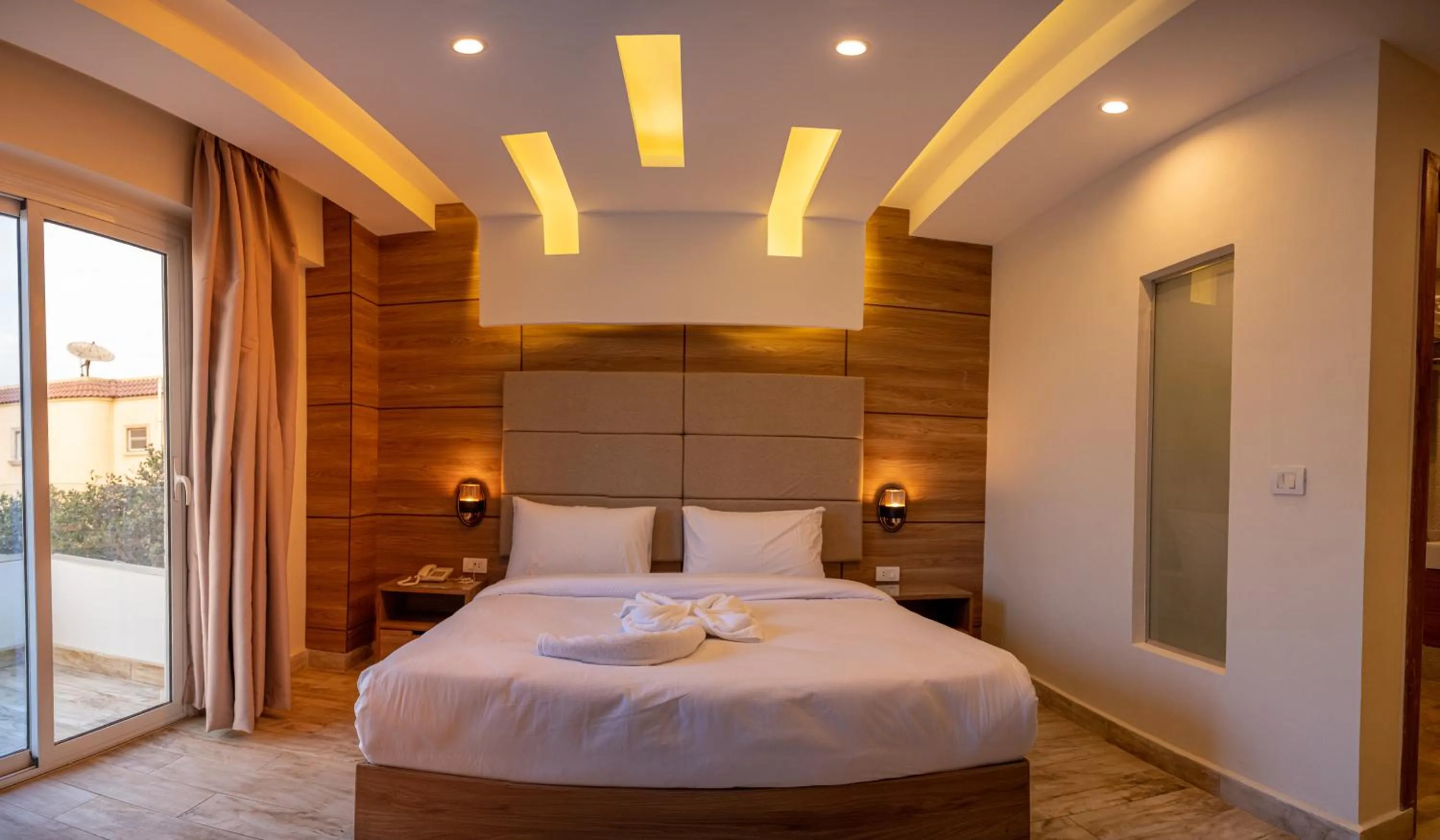 Bed in Nine Pyramids View Hotel