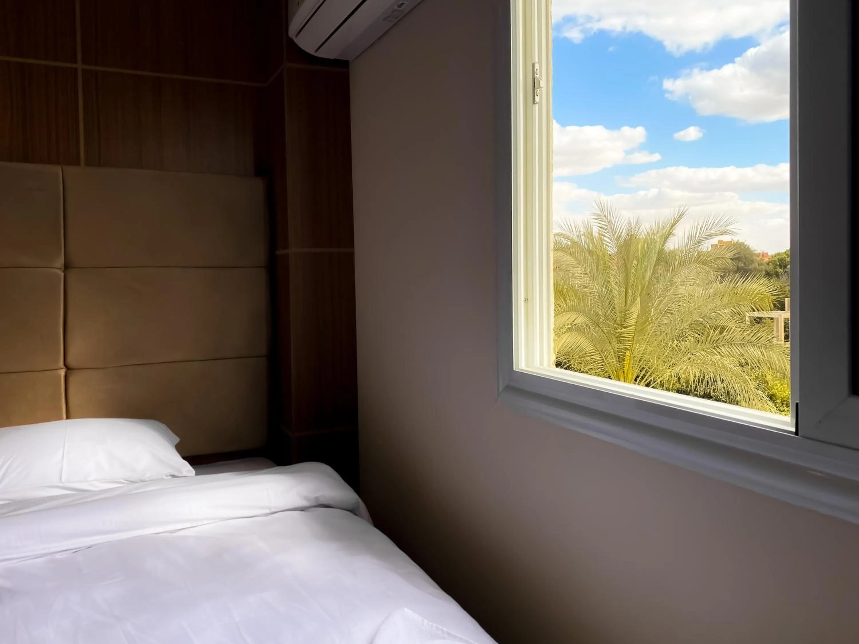 Bed in Nine Pyramids View Hotel