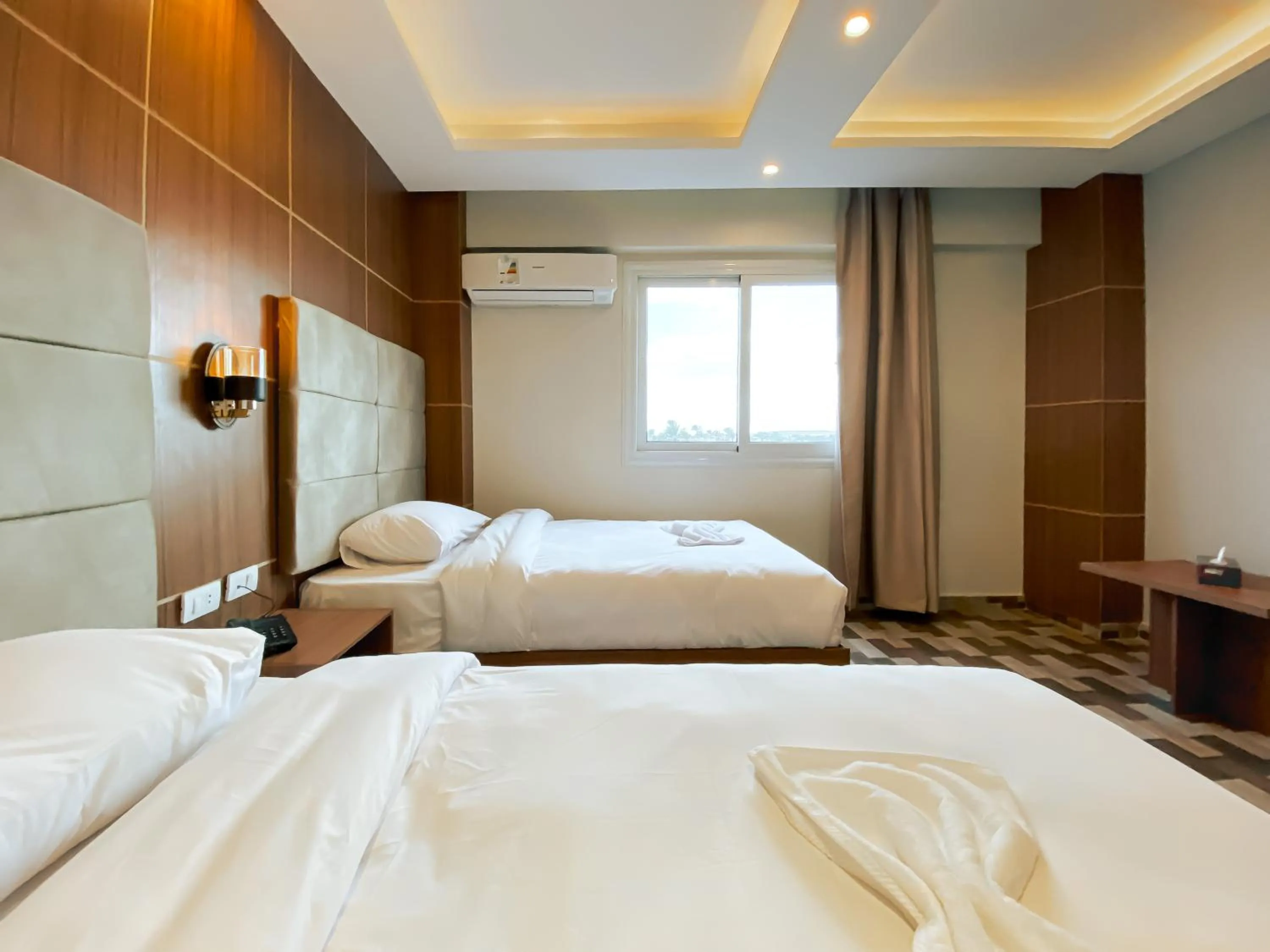 Bed in Nine Pyramids View Hotel