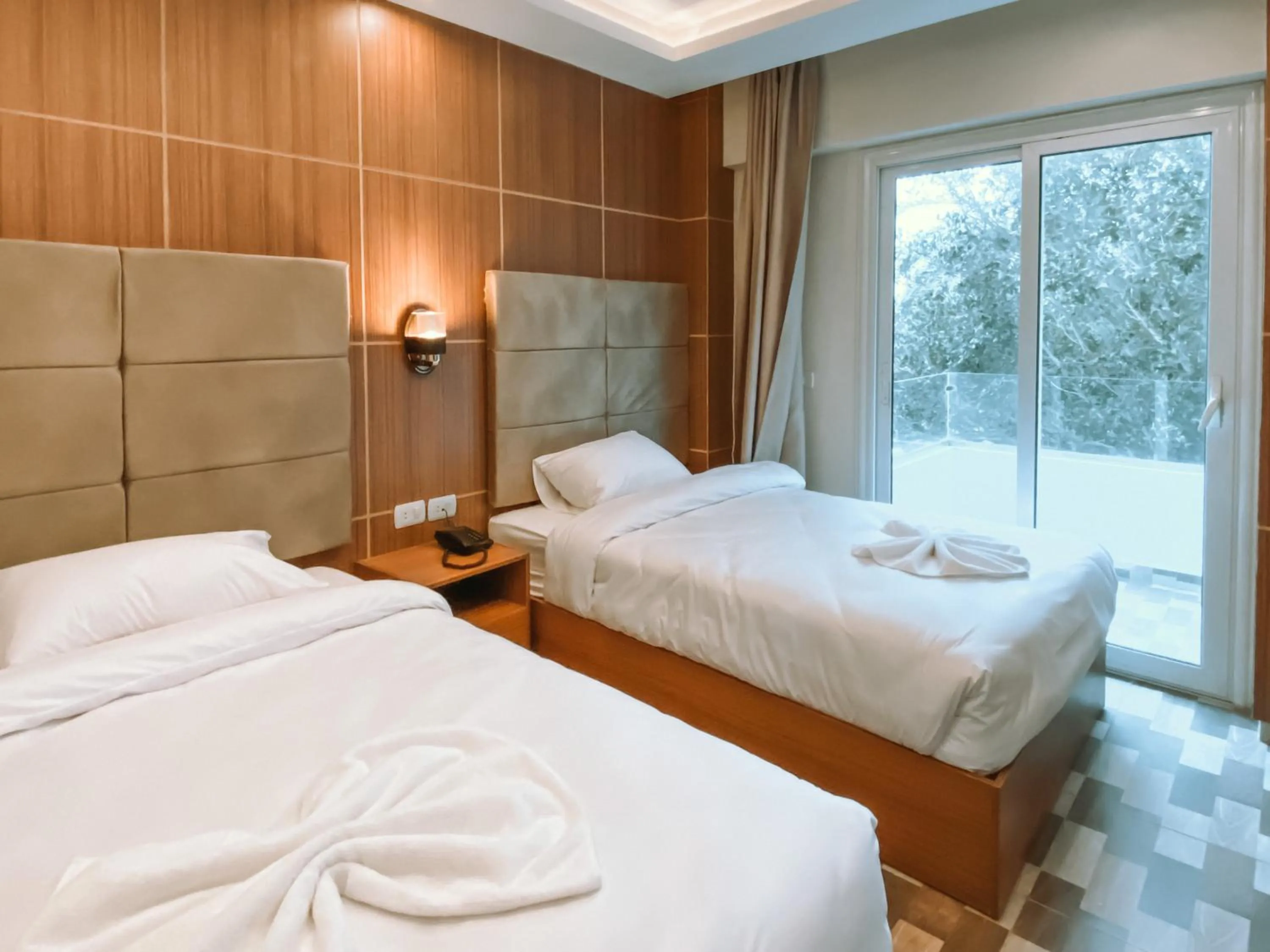 Bed in Nine Pyramids View Hotel