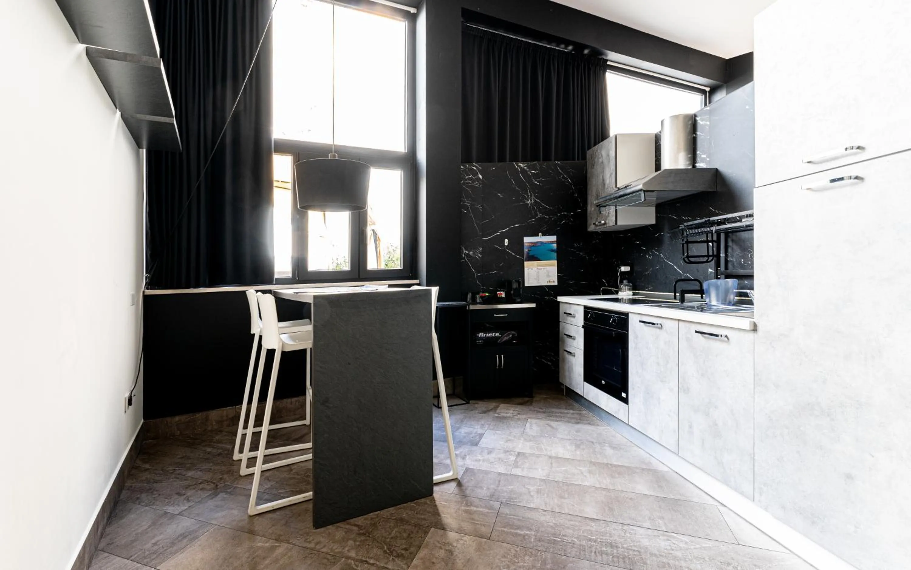 Kitchen or kitchenette in Neko Boutique Hotel