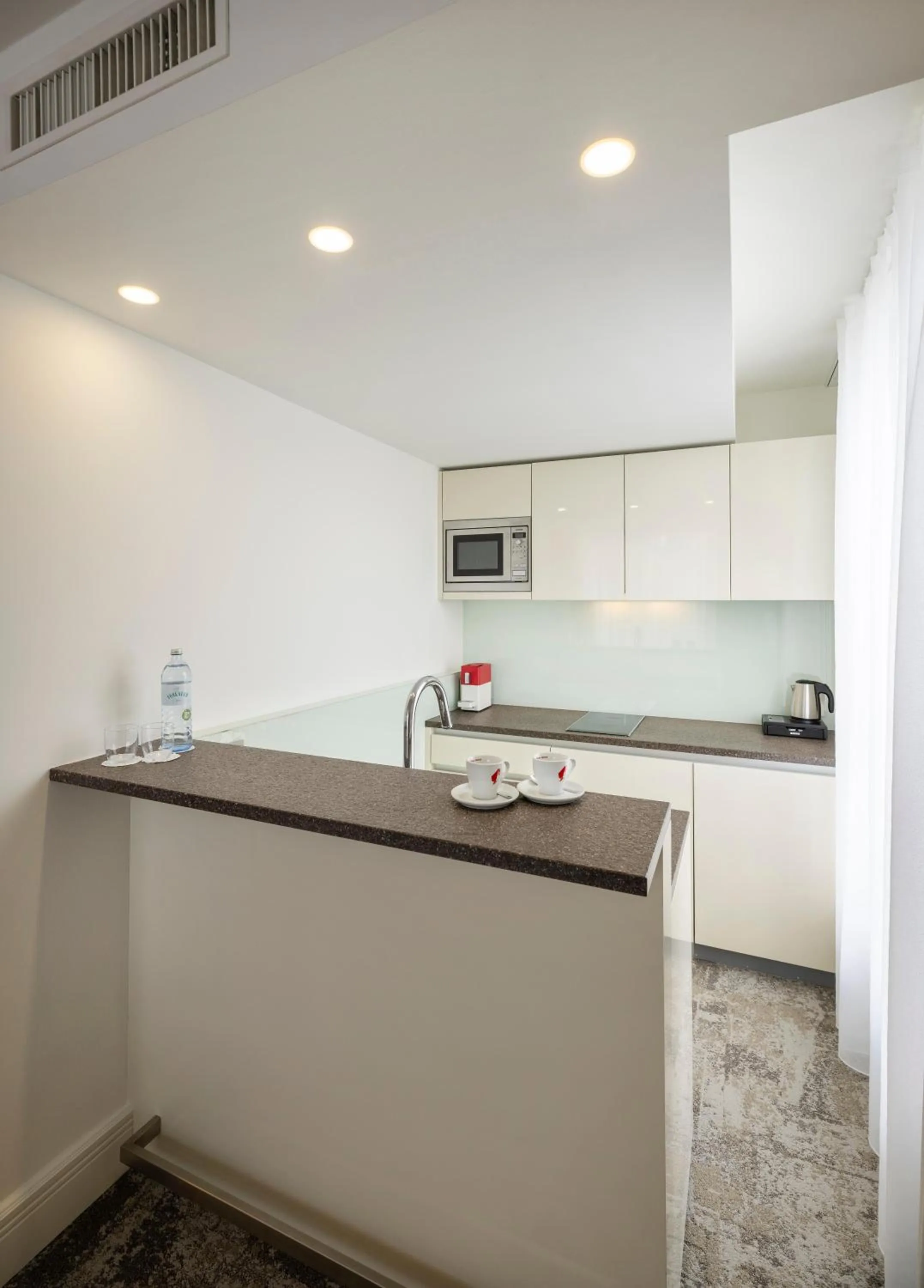 Kitchen or kitchenette in ARCOTEL Kaiserwasser Wien