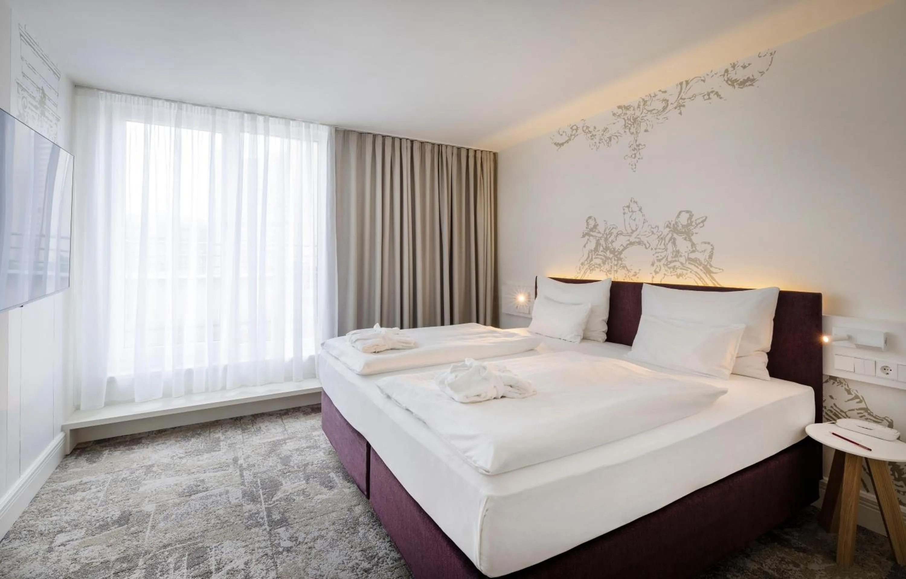 Bed in ARCOTEL Kaiserwasser Wien