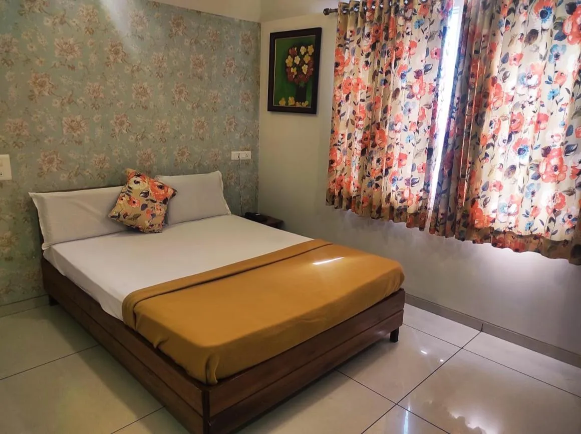 Bedroom in Hotel Prafulla Pure Veg