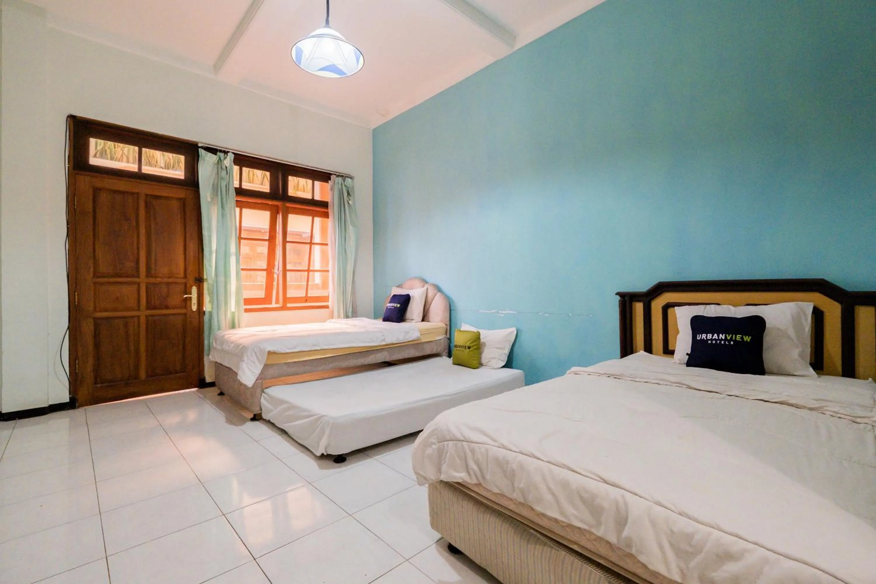 Bed in Palereman Hotel RedPartner near Jatim Park 1