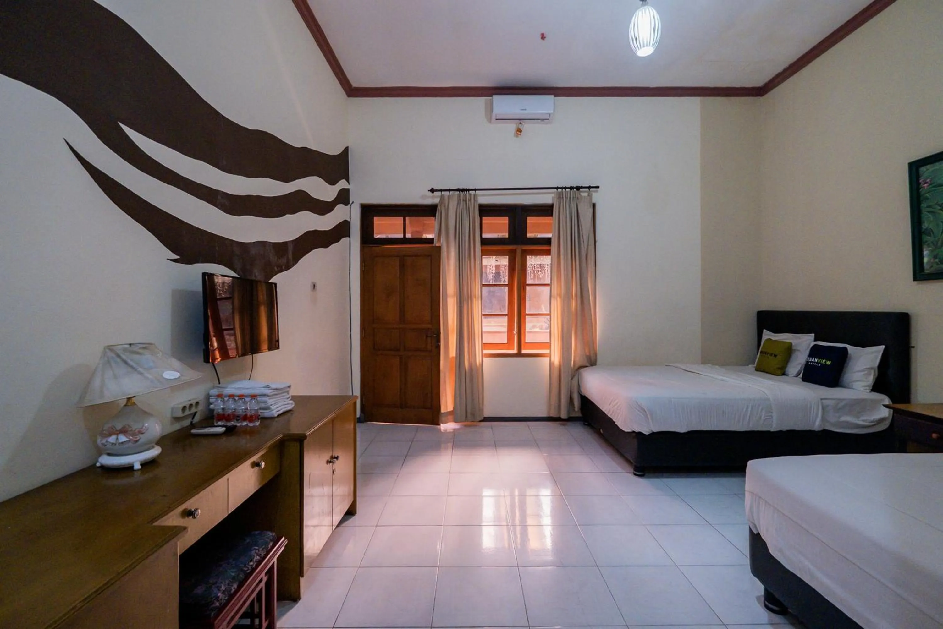 Bed in Palereman Hotel RedPartner near Jatim Park 1